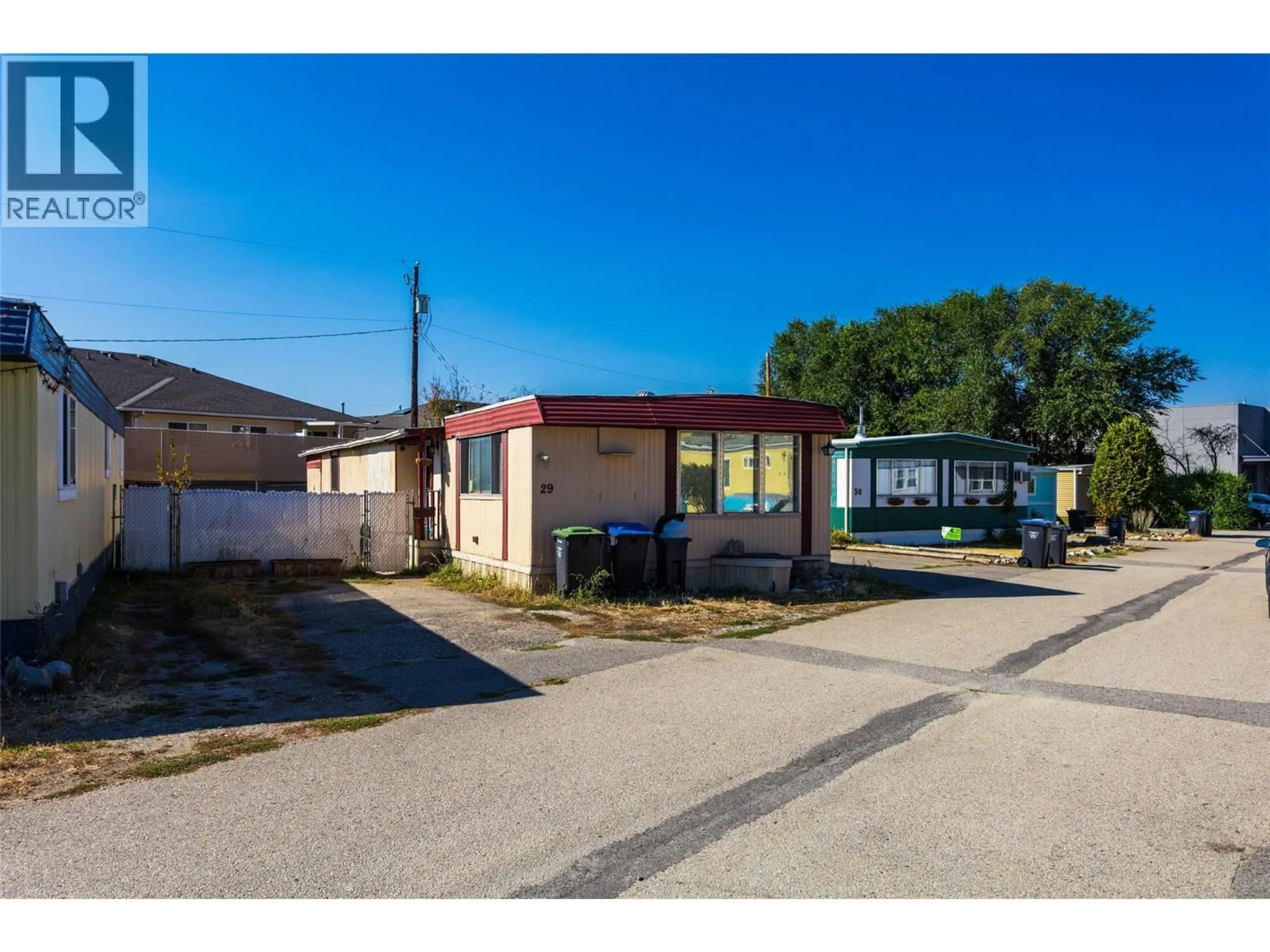 A pic from outside/outdoor area/front of a property/back of a property/a pic from drone, street for 29 - 1925 BARON ROAD, Kelowna British Columbia V1X6W2