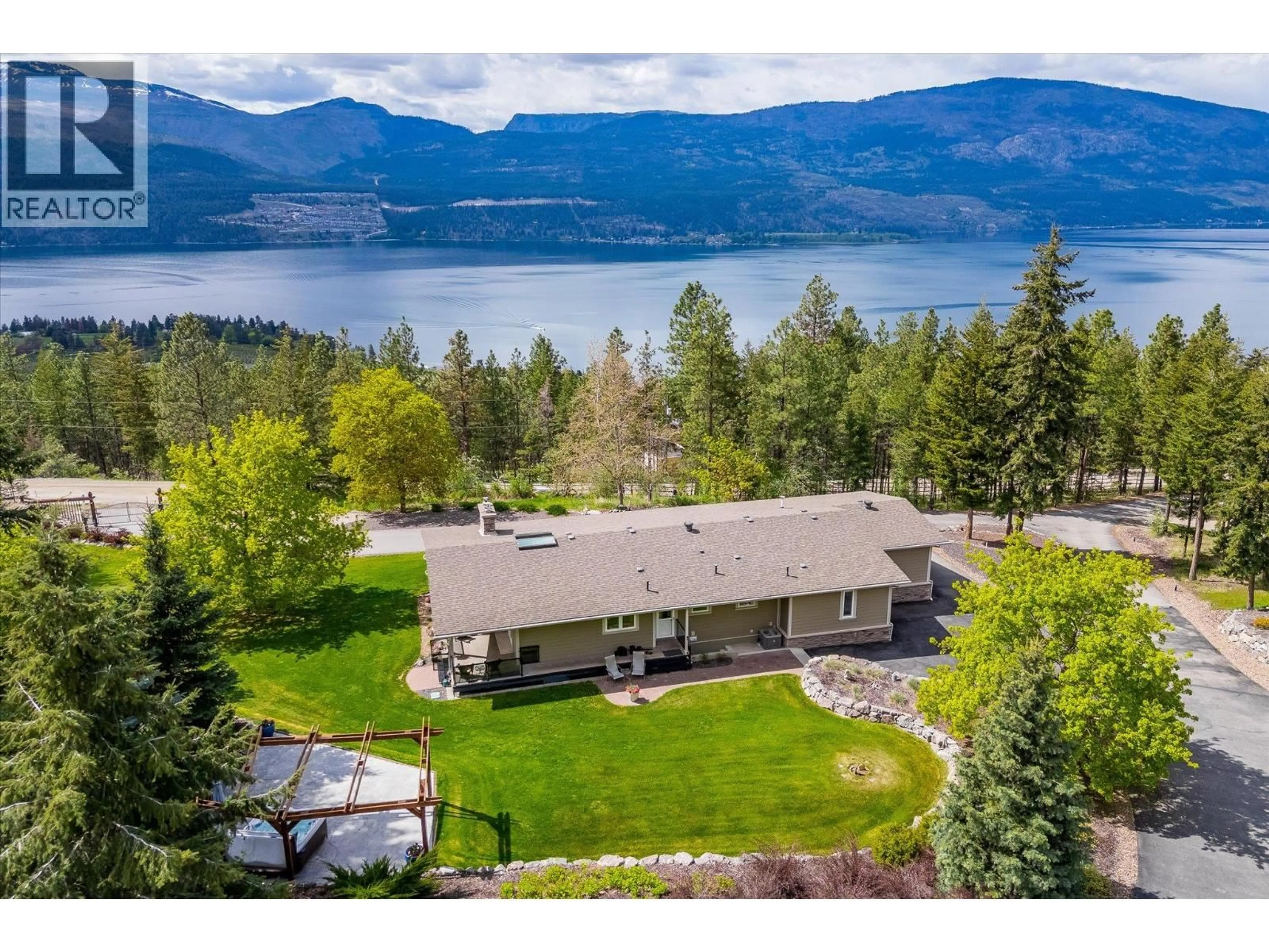 A pic from outside/outdoor area/front of a property/back of a property/a pic from drone, water/lake/river/ocean view for 16151 BARKLEY ROAD, Lake Country British Columbia V4V1B4