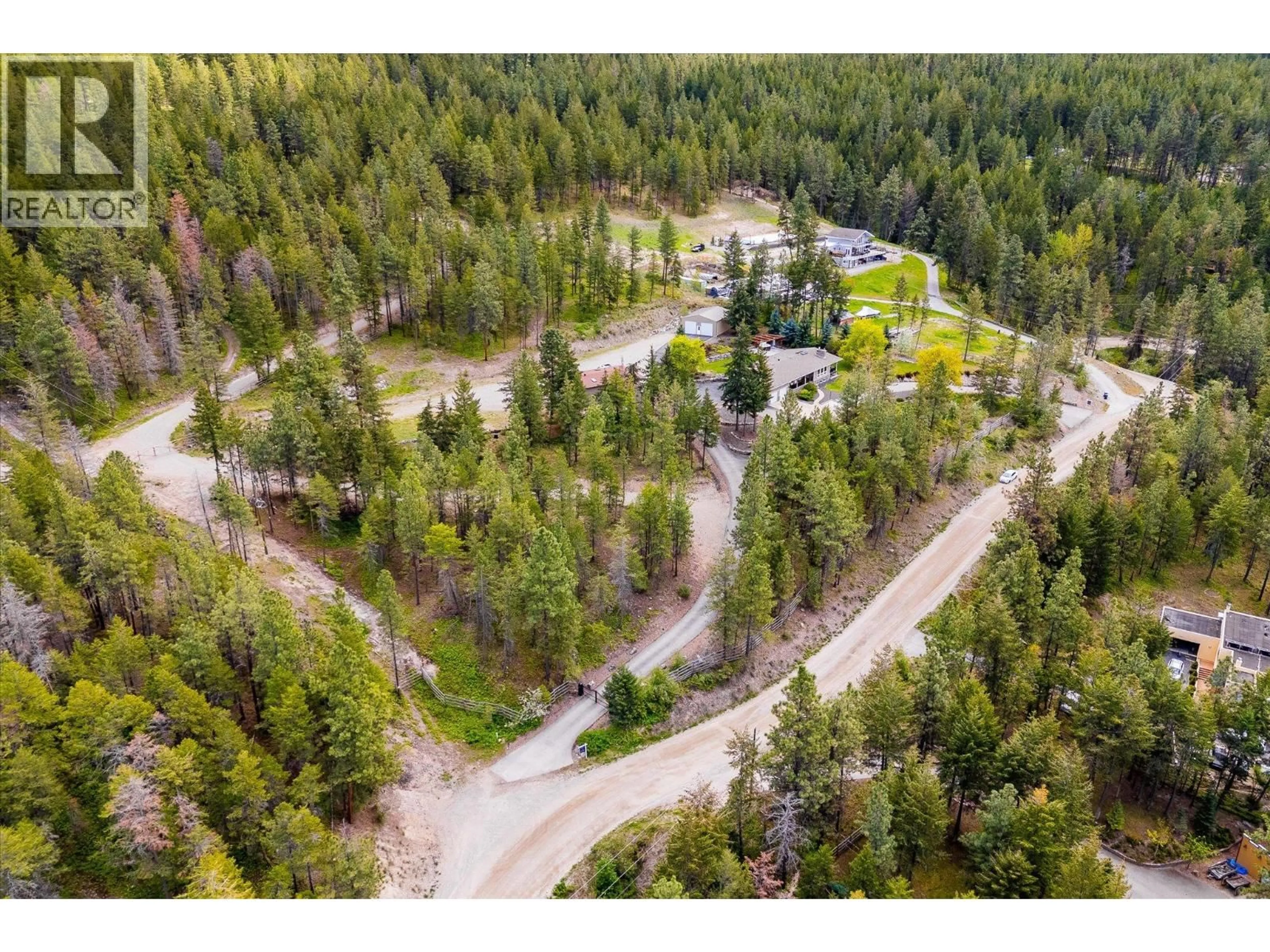 A pic from outside/outdoor area/front of a property/back of a property/a pic from drone, forest/trees view for 16151 BARKLEY ROAD, Lake Country British Columbia V4V1B4