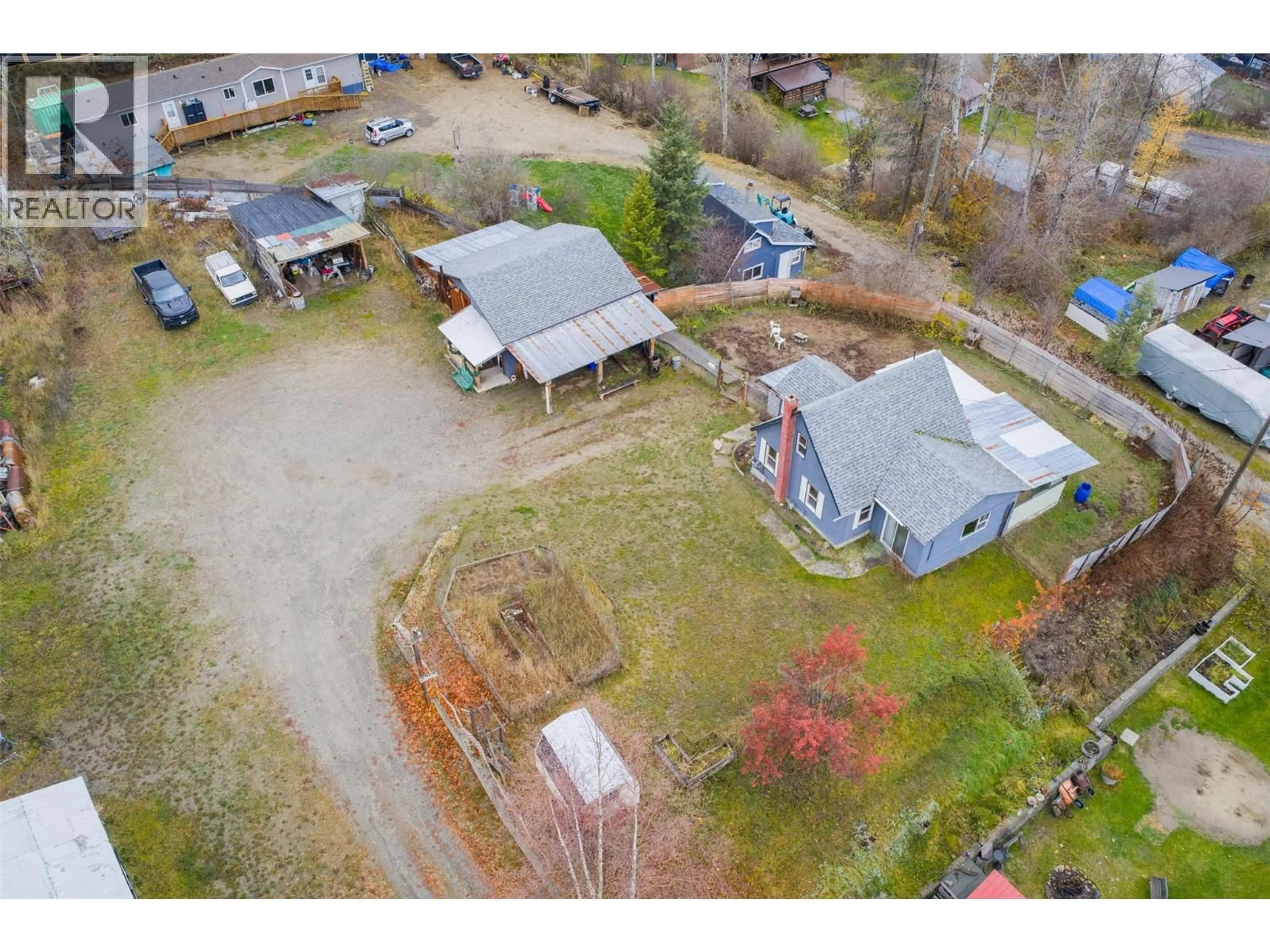 A pic from outside/outdoor area/front of a property/back of a property/a pic from drone, street for 35 LAHUE ROAD, Fruitvale British Columbia V0G1L0