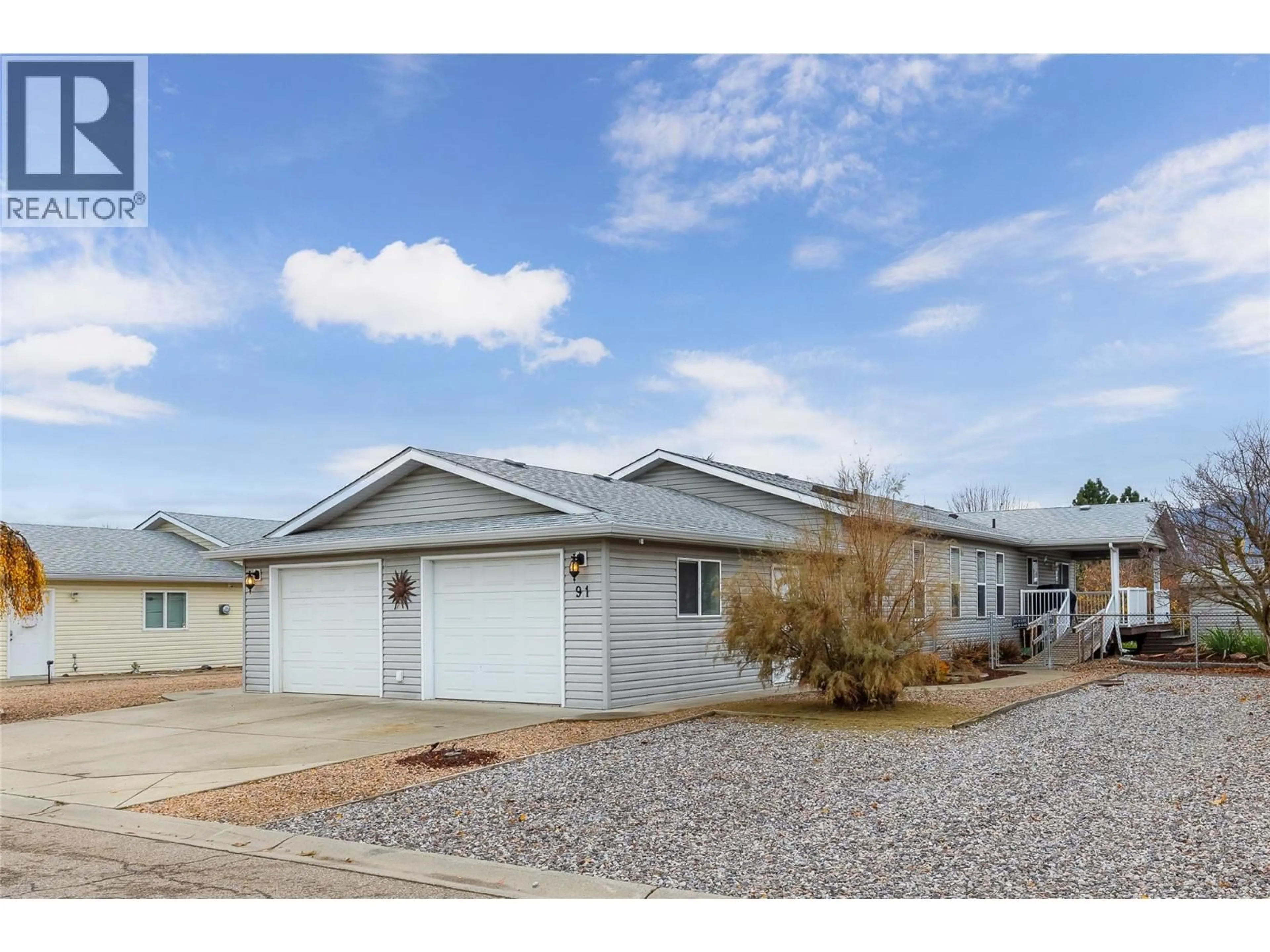 Home with vinyl exterior material, street for 91 - 9510 HWY 97N OTHER, Vernon British Columbia V1H1R8