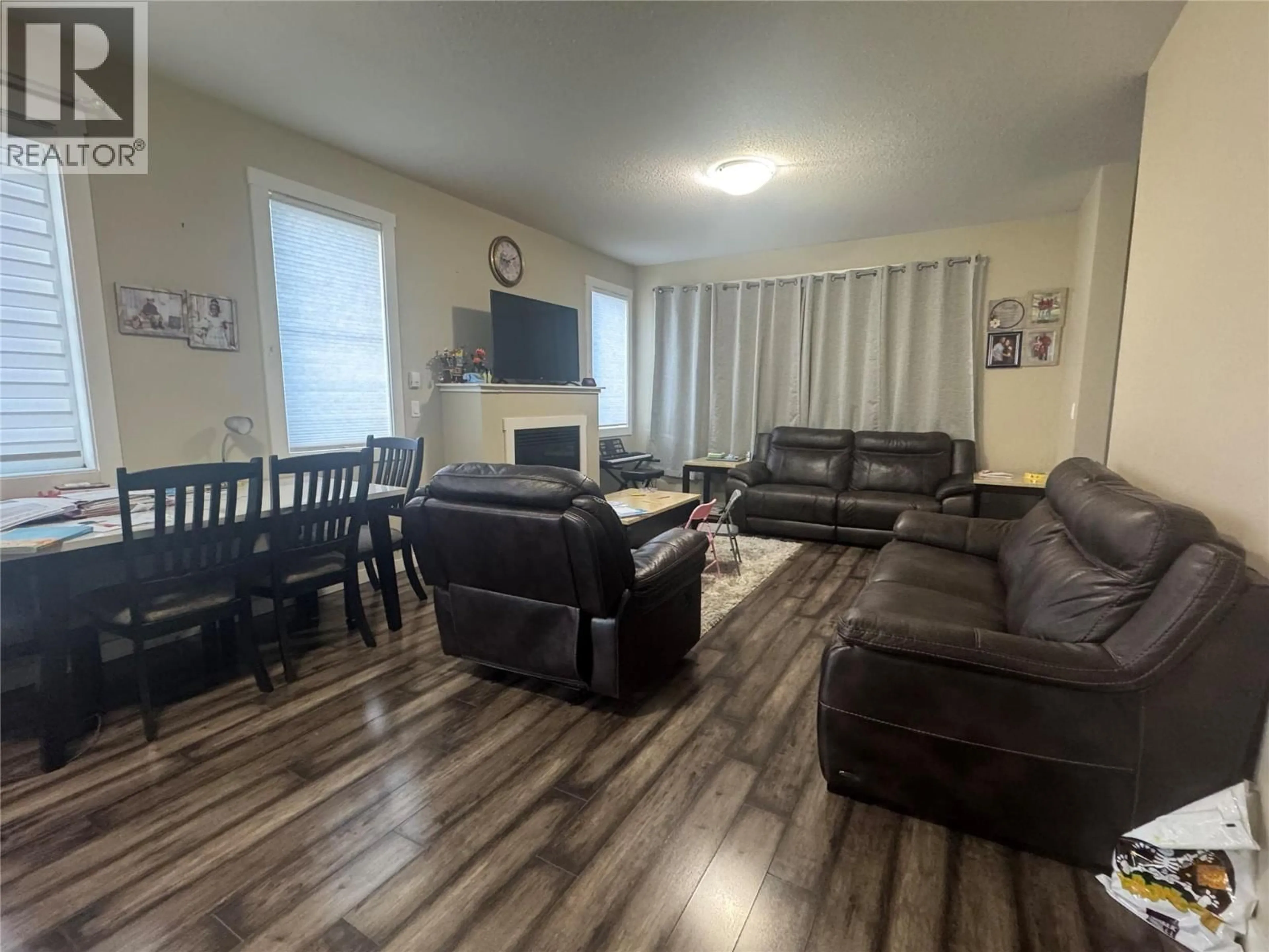 Living room with furniture, unknown for 8716 17 STREET, Dawson Creek British Columbia V1G0H1