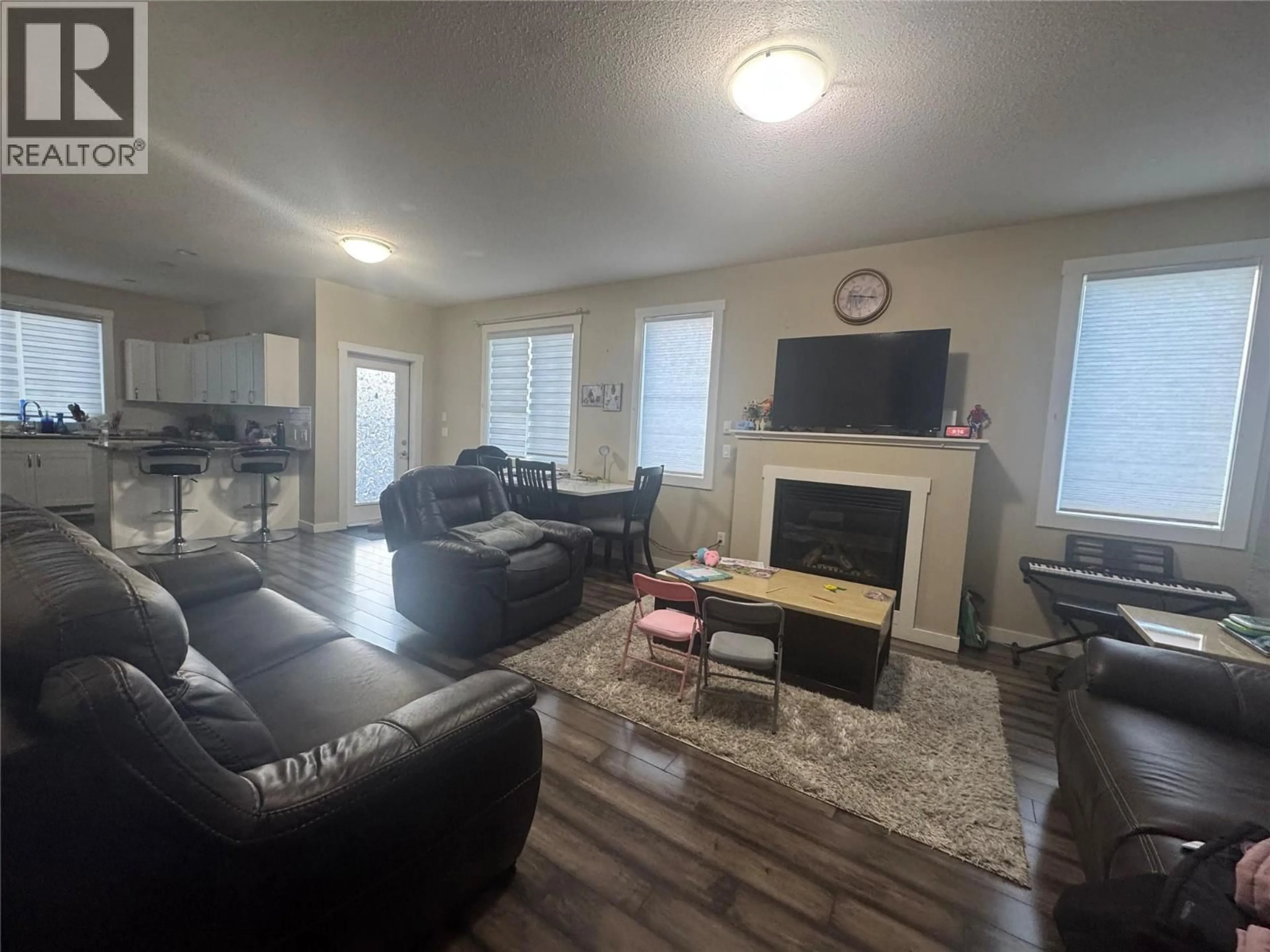 Living room with furniture, unknown for 8716 17 STREET, Dawson Creek British Columbia V1G0H1