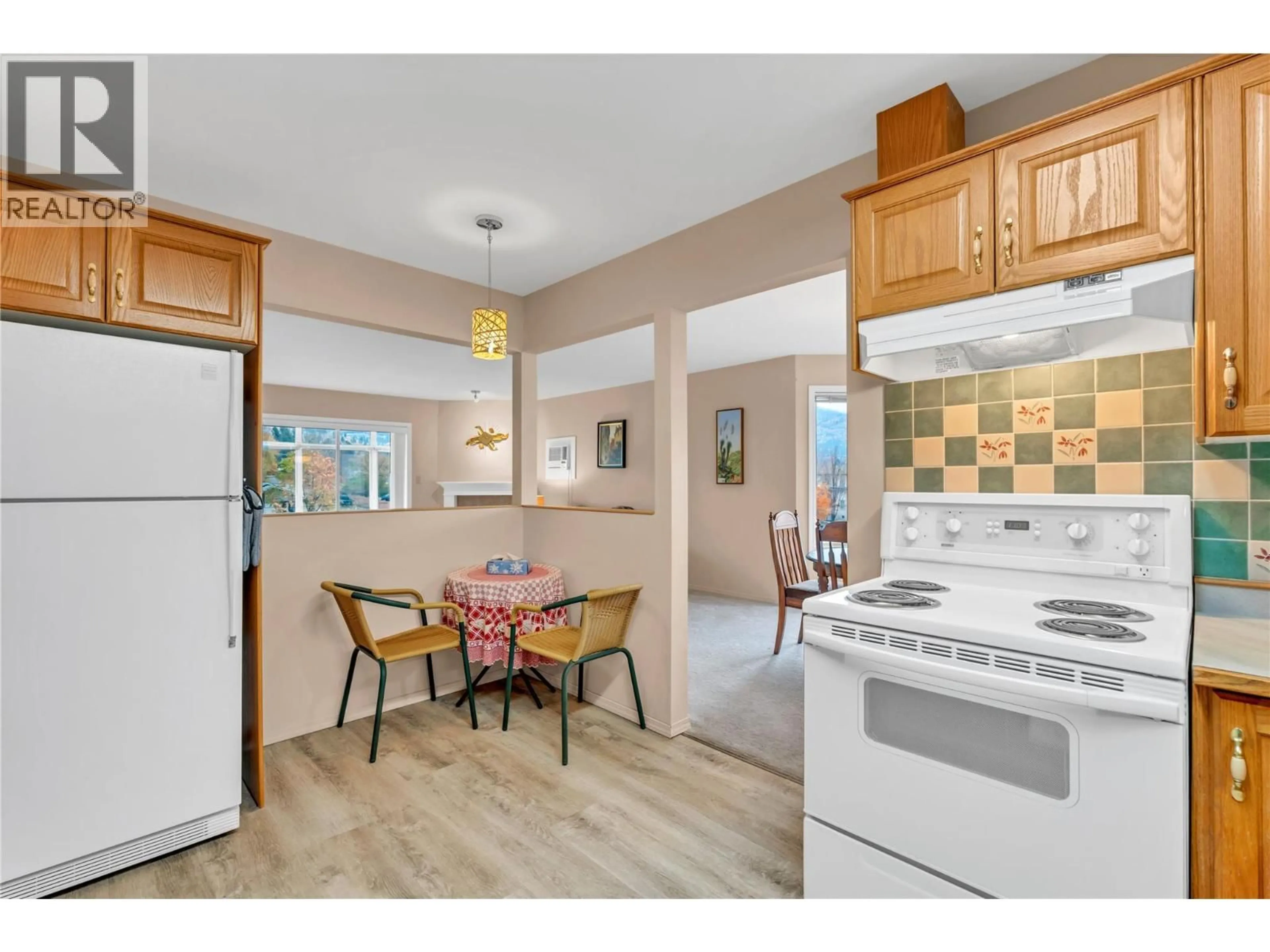 Open concept kitchen, ceramic/tile floor for 308 - 965 KING STREET, Penticton British Columbia V2A8J4