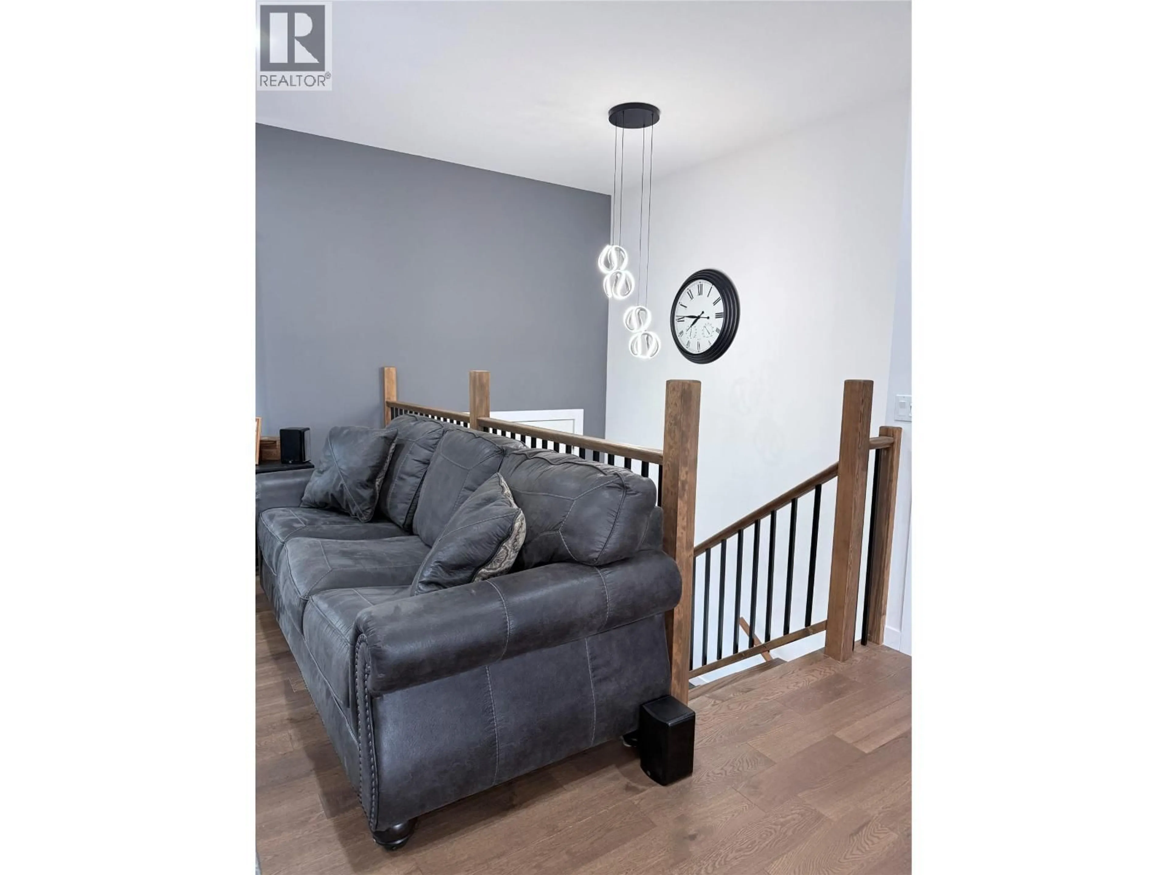 Living room with furniture, wood/laminate floor for 8779 MOUNTAIN VIEW STREET, Canal Flats British Columbia V0B1B0