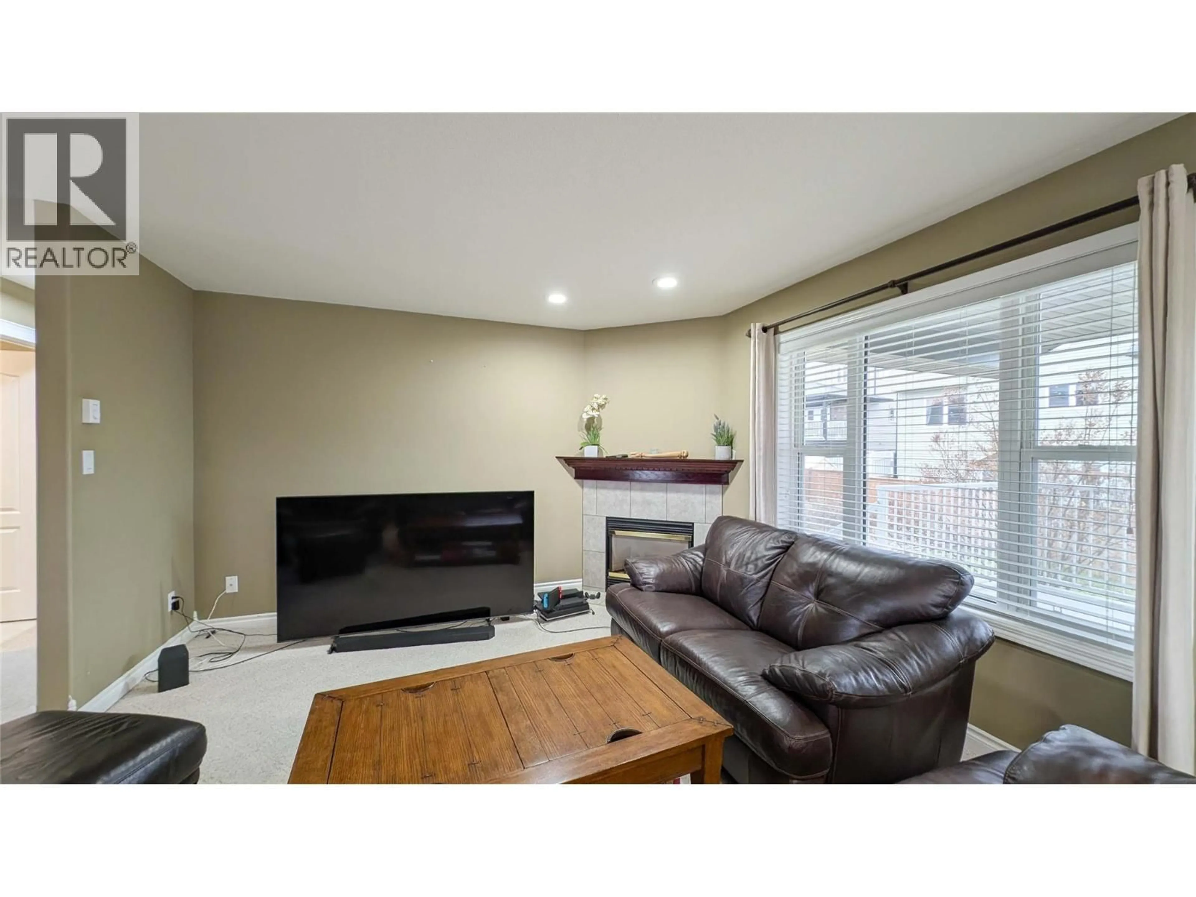 Living room with furniture, wood/laminate floor for 3301 MT FISHER N DRIVE, Cranbrook British Columbia V1C6N6