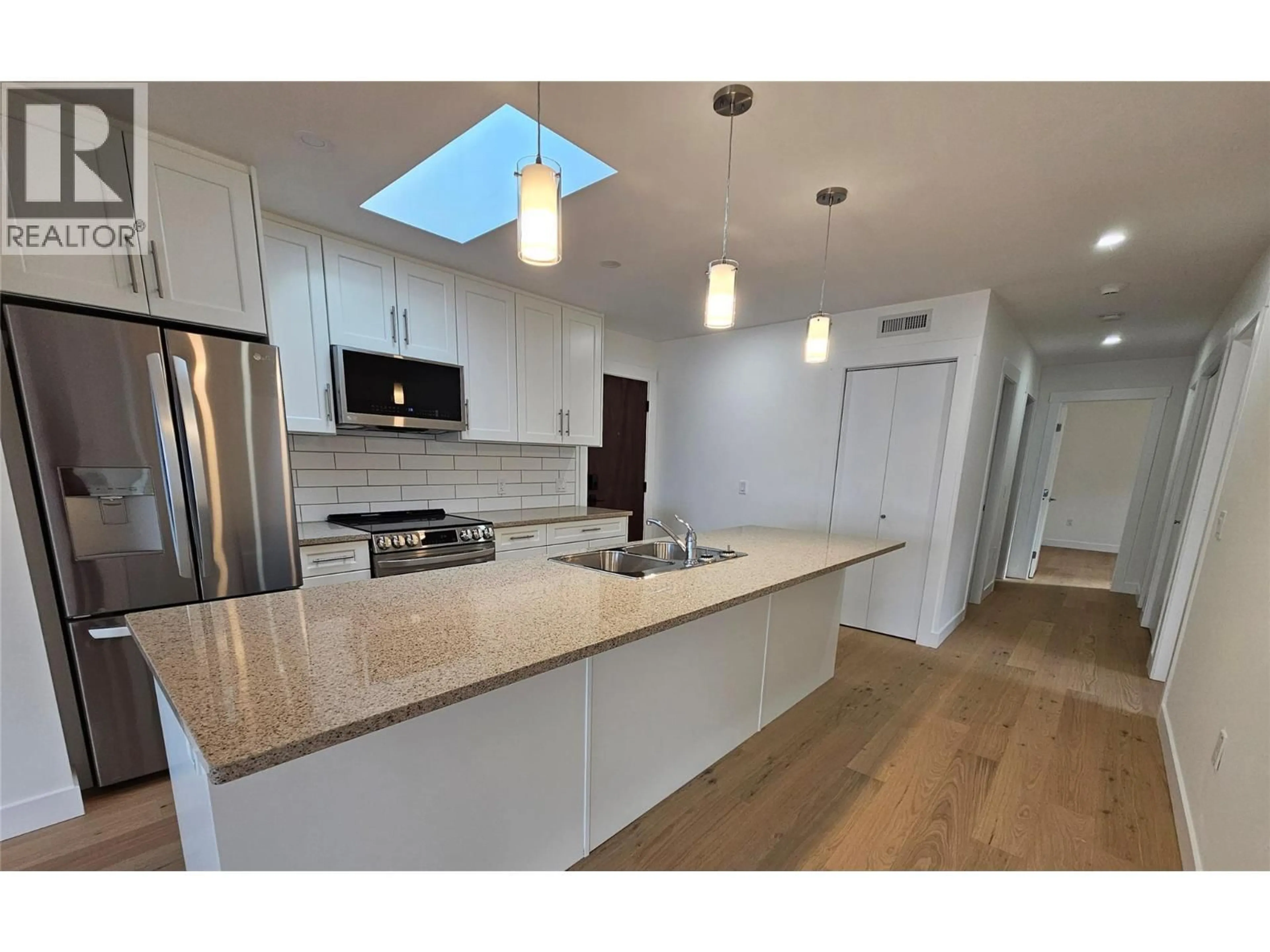 Open concept kitchen, unknown for 402 - 578 LAKESHORE DRIVE, Penticton British Columbia V2A1B9