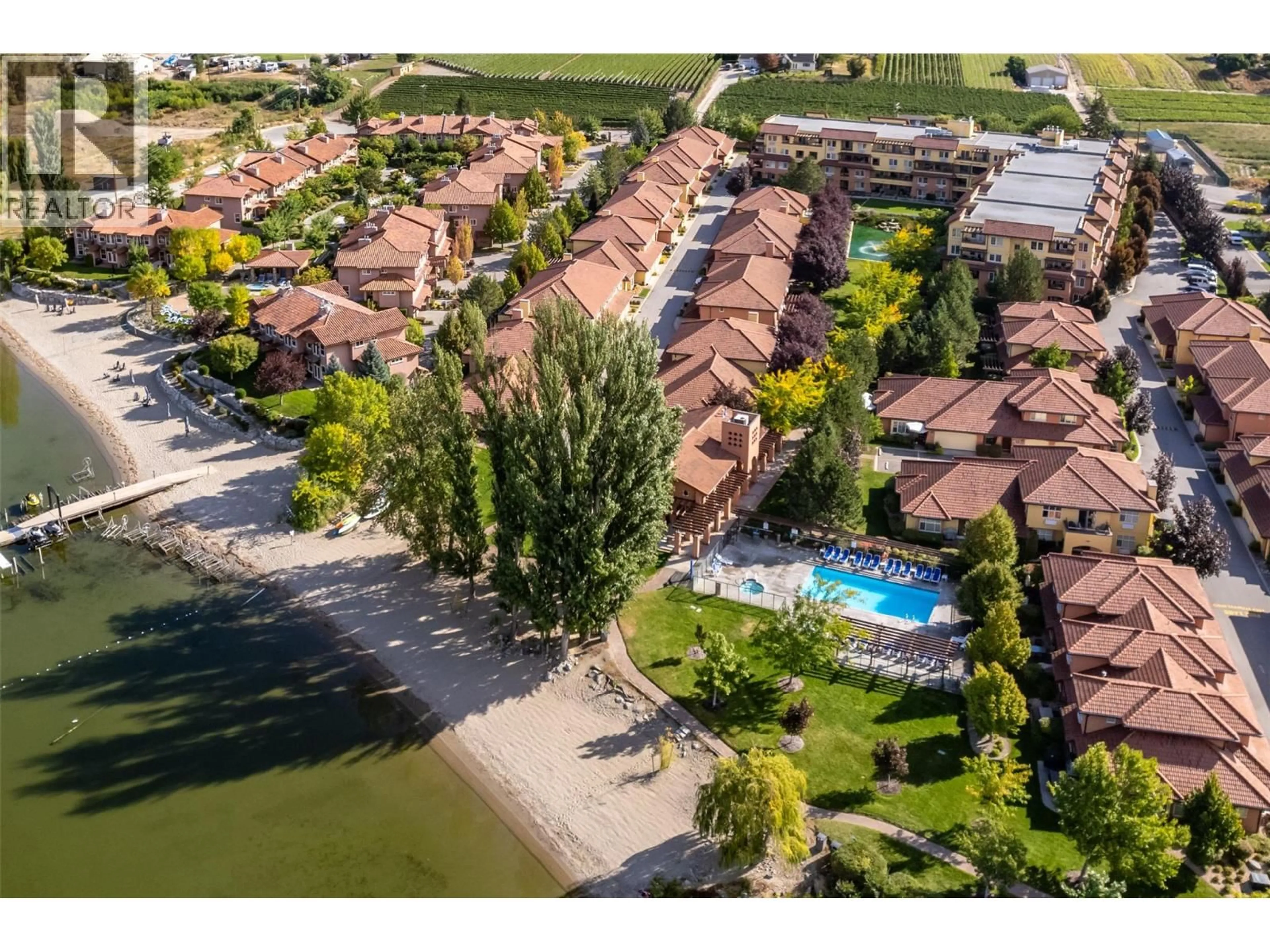 A pic from outside/outdoor area/front of a property/back of a property/a pic from drone, water/lake/river/ocean view for 404 - 7600 COTTONWOOD DRIVE, Osoyoos British Columbia V0H1V0