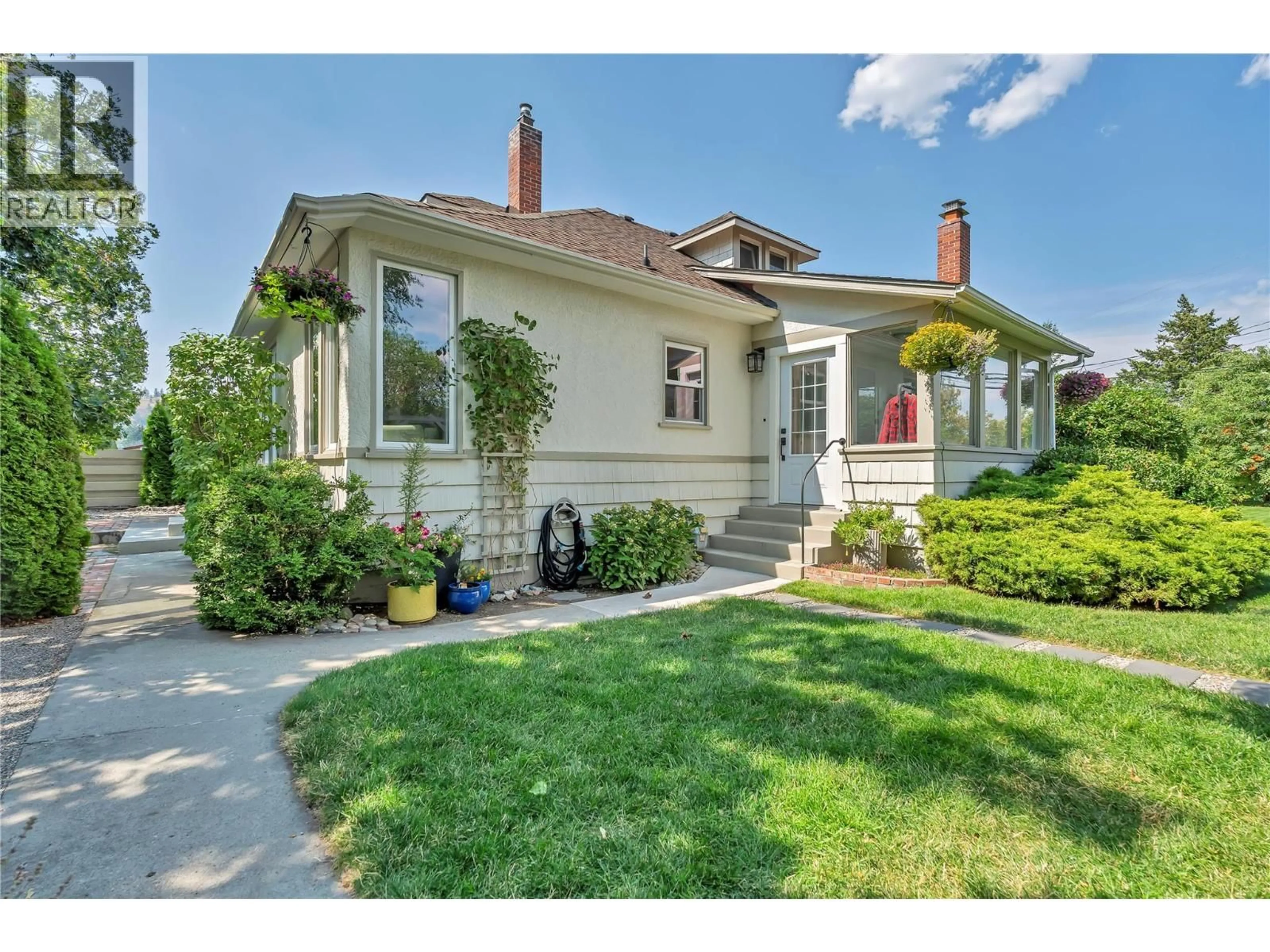 Home with brick exterior material, street for 12432 VICTORIA ROAD SOUTH, Summerland British Columbia V0H1Z0