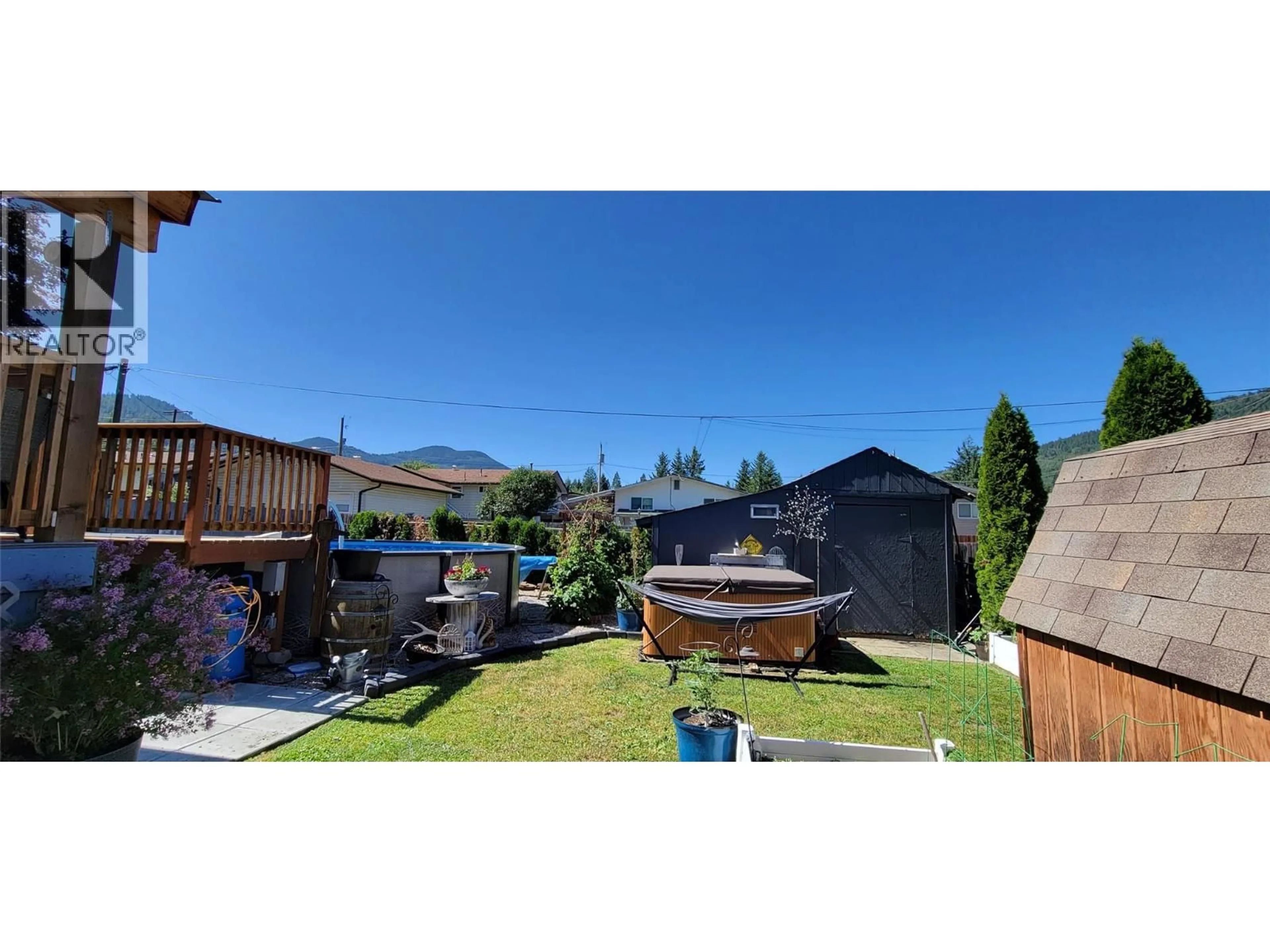 A pic from outside/outdoor area/front of a property/back of a property/a pic from drone, unknown for 77 JUNIPER AVENUE, Fruitvale British Columbia V0G1L0