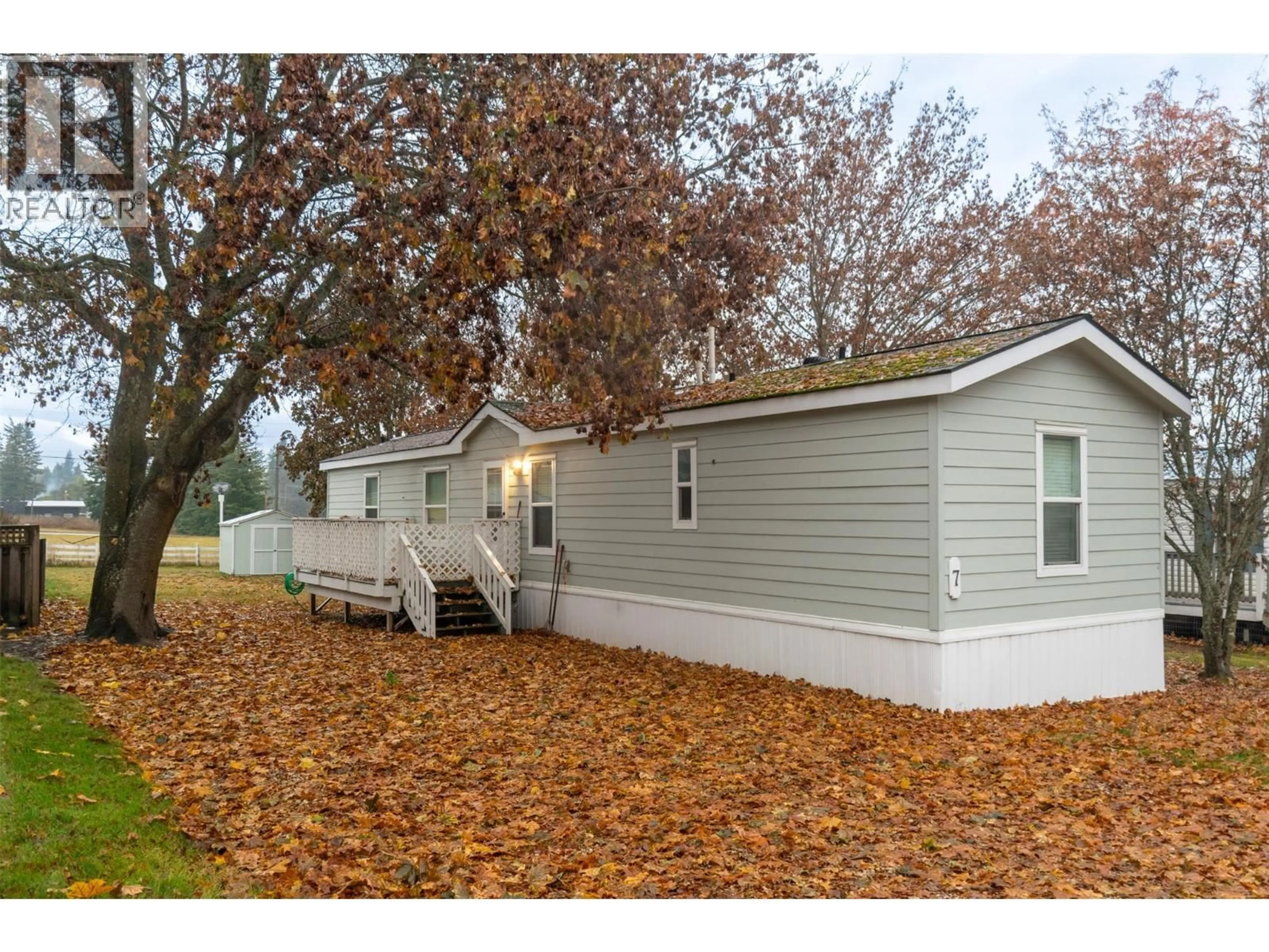 Home with vinyl exterior material, street for 7 - 5581 MAYFAIR ROAD, Salmon Arm British Columbia V1E4M3