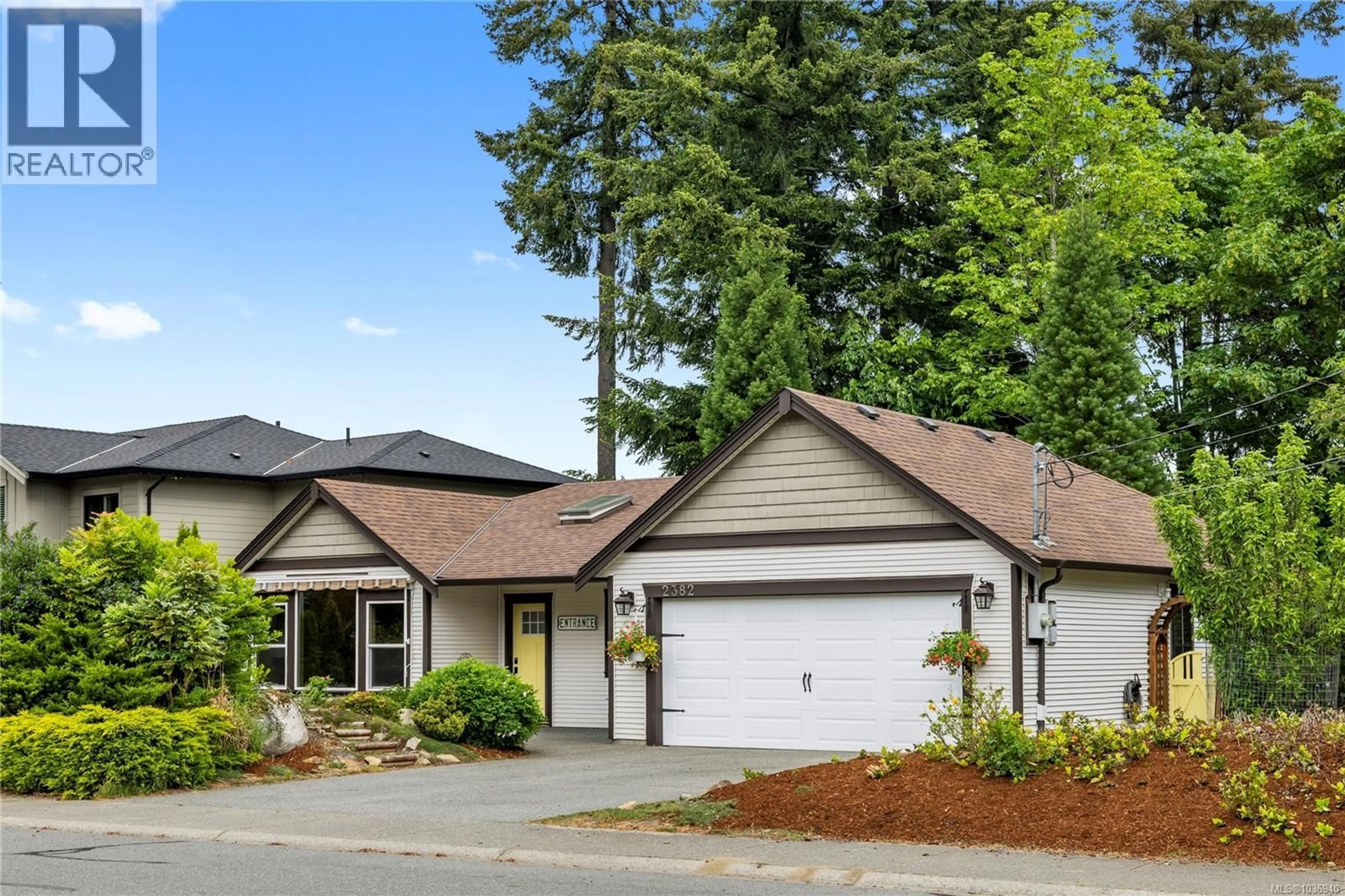 Home with vinyl exterior material, street for 2382 MILL ROAD, Nanaimo British Columbia V9R6M9
