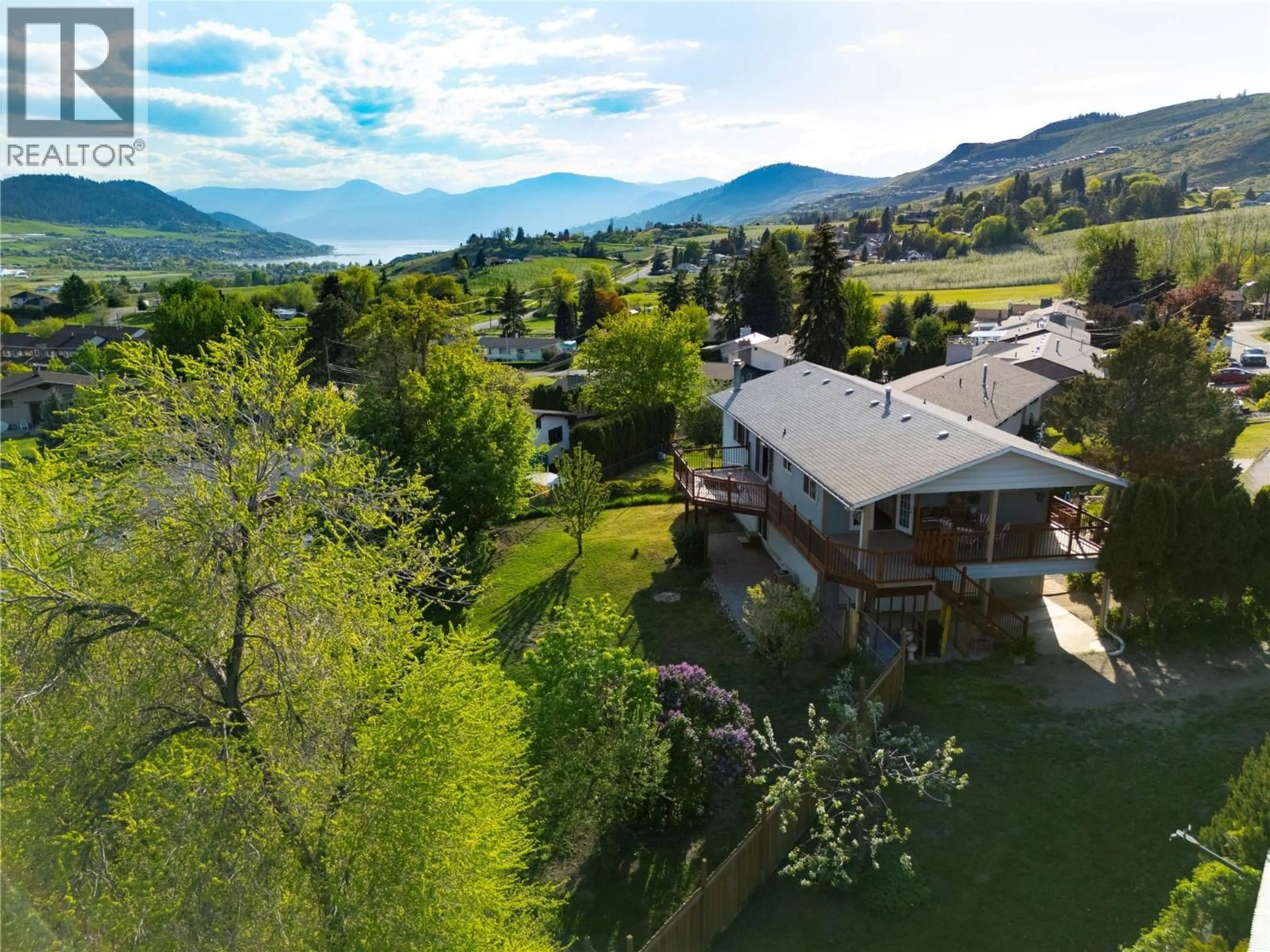 A pic from outside/outdoor area/front of a property/back of a property/a pic from drone, mountain view for 5826 BARTLETT ROAD, Vernon British Columbia V1H1B2
