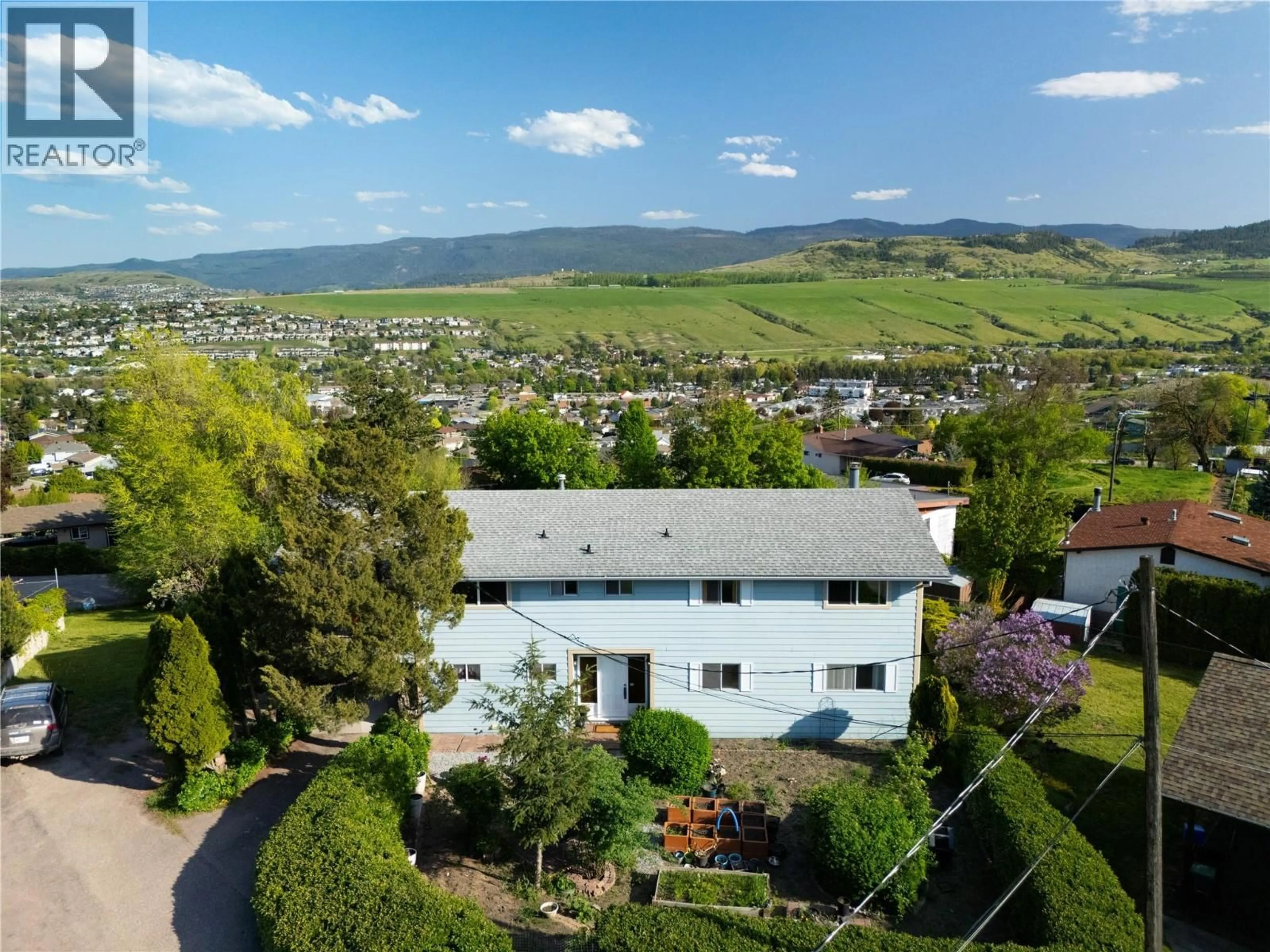 A pic from outside/outdoor area/front of a property/back of a property/a pic from drone, mountain view for 5826 BARTLETT ROAD, Vernon British Columbia V1H1B2