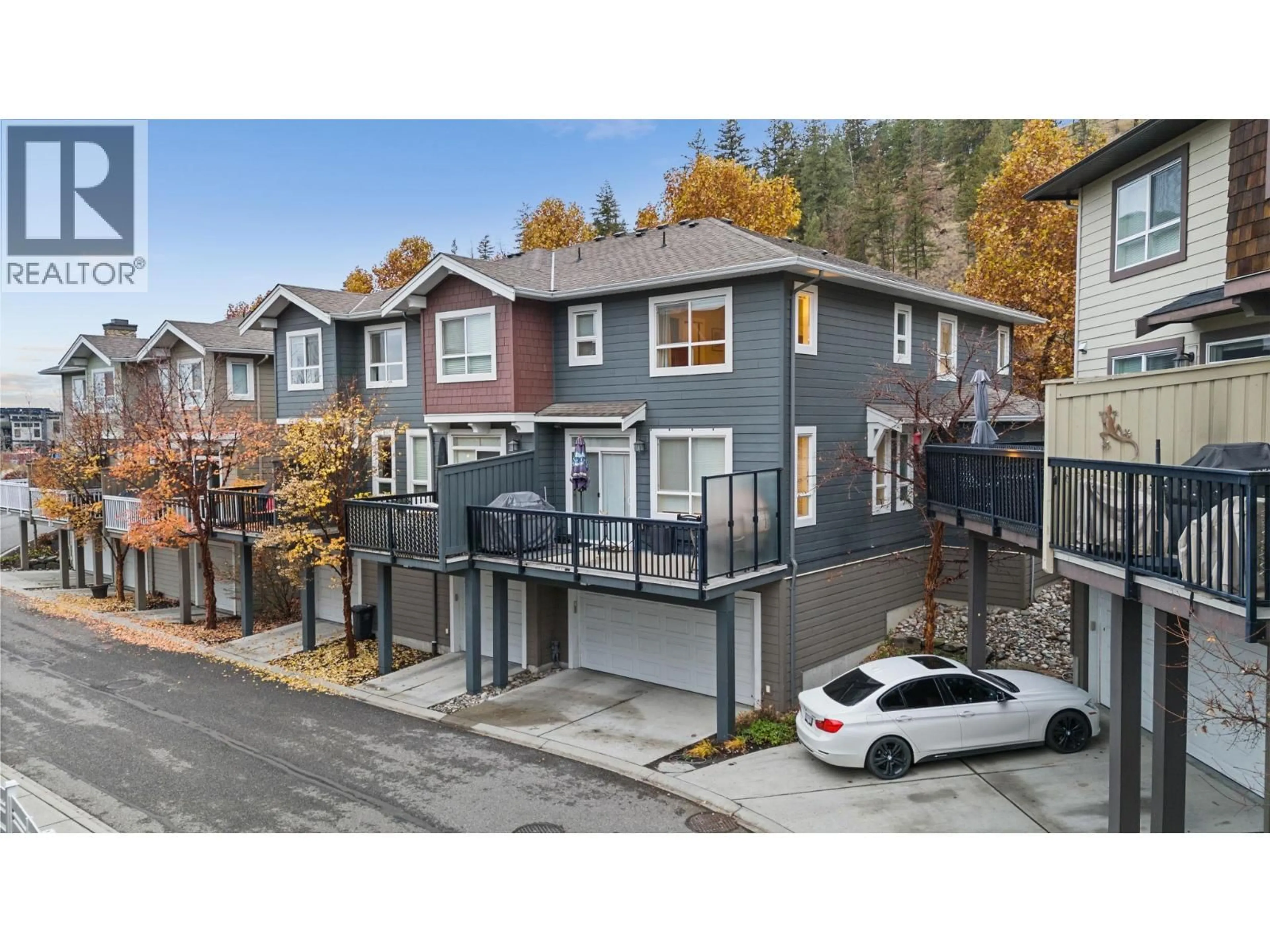 A pic from outside/outdoor area/front of a property/back of a property/a pic from drone, street for 613 BOYNTON PLACE, Kelowna British Columbia V1V3B5