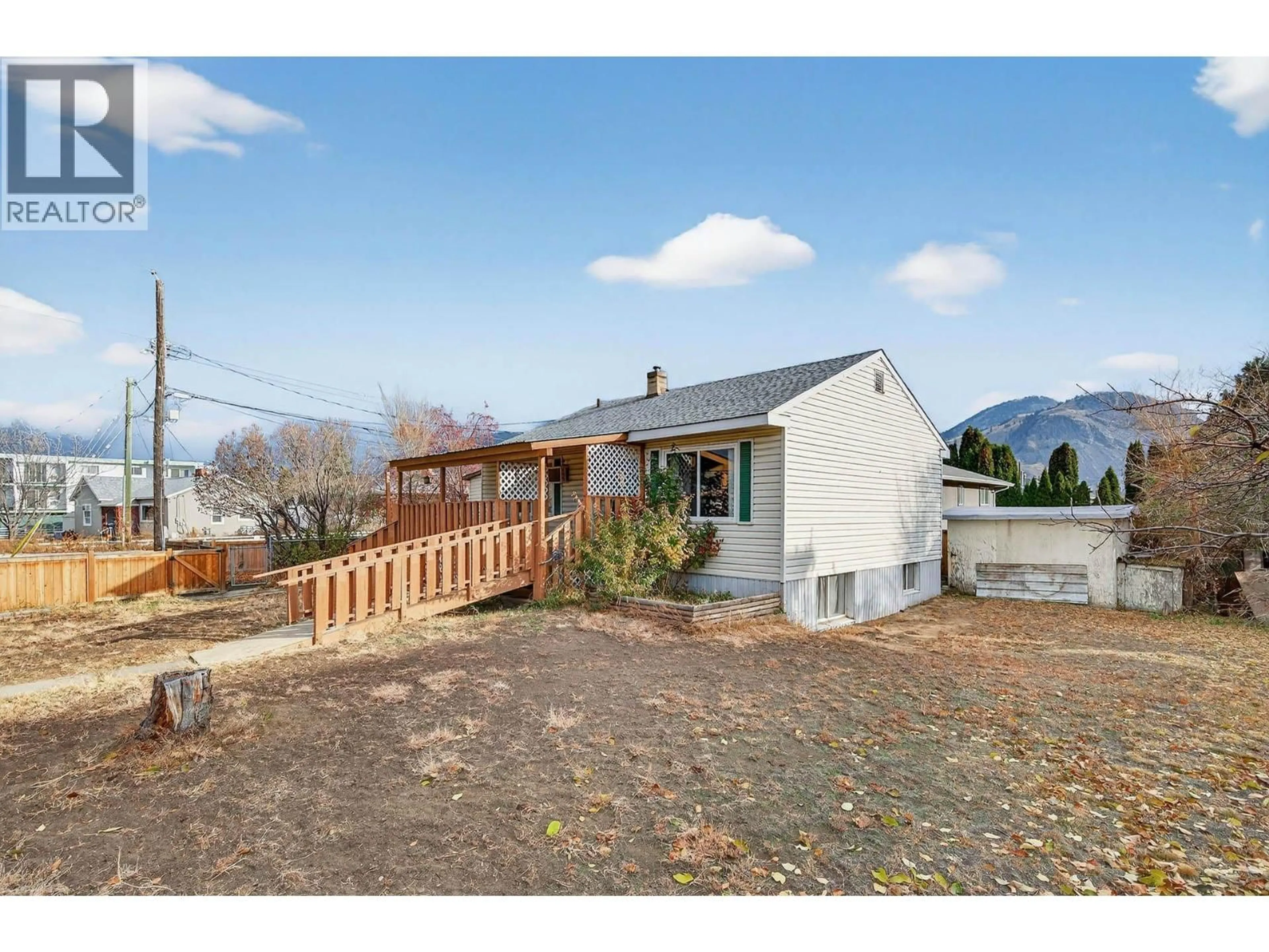 A pic from outside/outdoor area/front of a property/back of a property/a pic from drone, mountain view for 620 FORTUNE DRIVE, Kamloops British Columbia V2B2K3