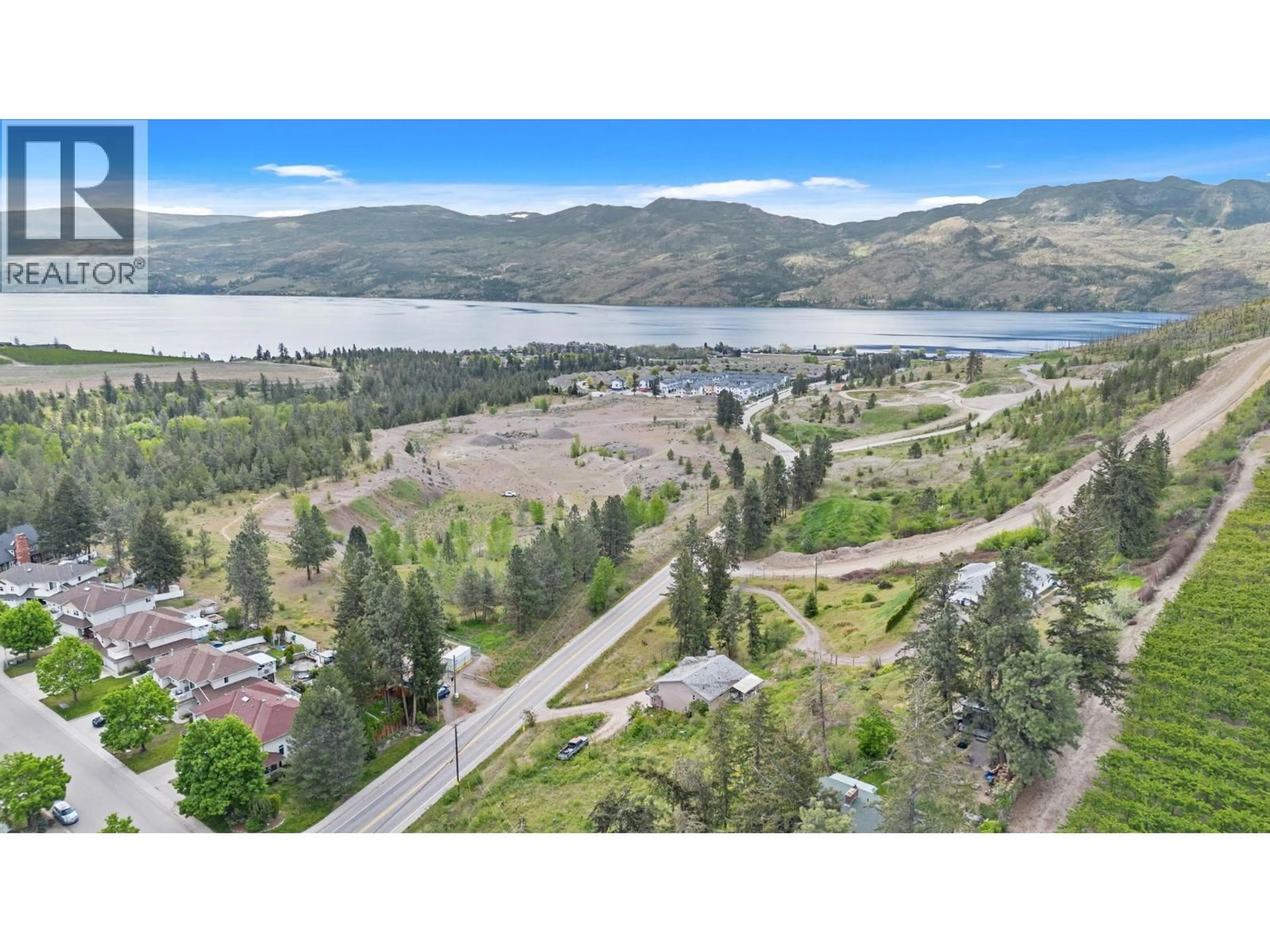 A pic from outside/outdoor area/front of a property/back of a property/a pic from drone, water/lake/river/ocean view for 3830 GELLATLY ROAD SOUTH, West Kelowna British Columbia V4T2K6