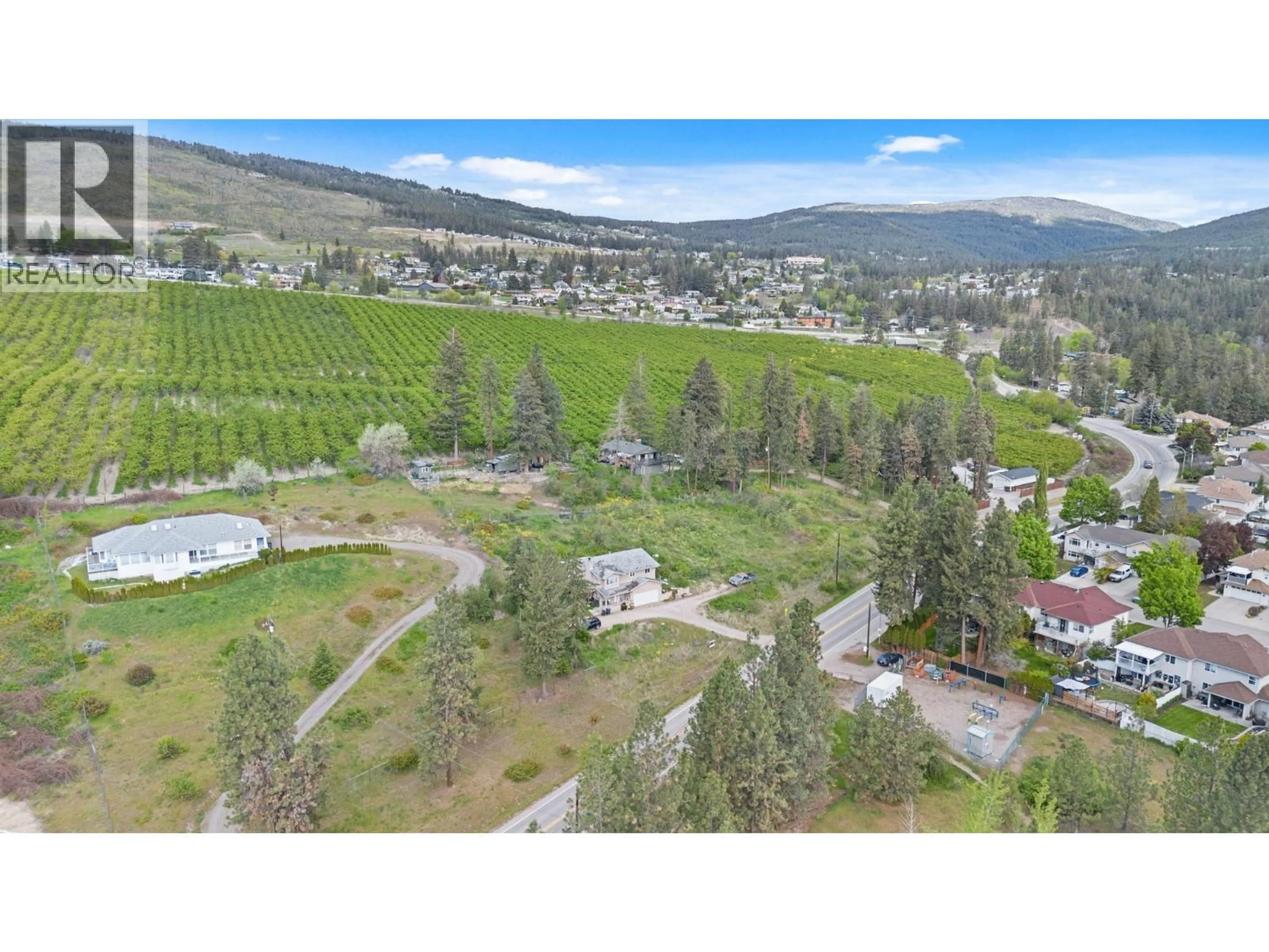A pic from outside/outdoor area/front of a property/back of a property/a pic from drone, mountain view for 3830 GELLATLY ROAD SOUTH, West Kelowna British Columbia V4T2K6