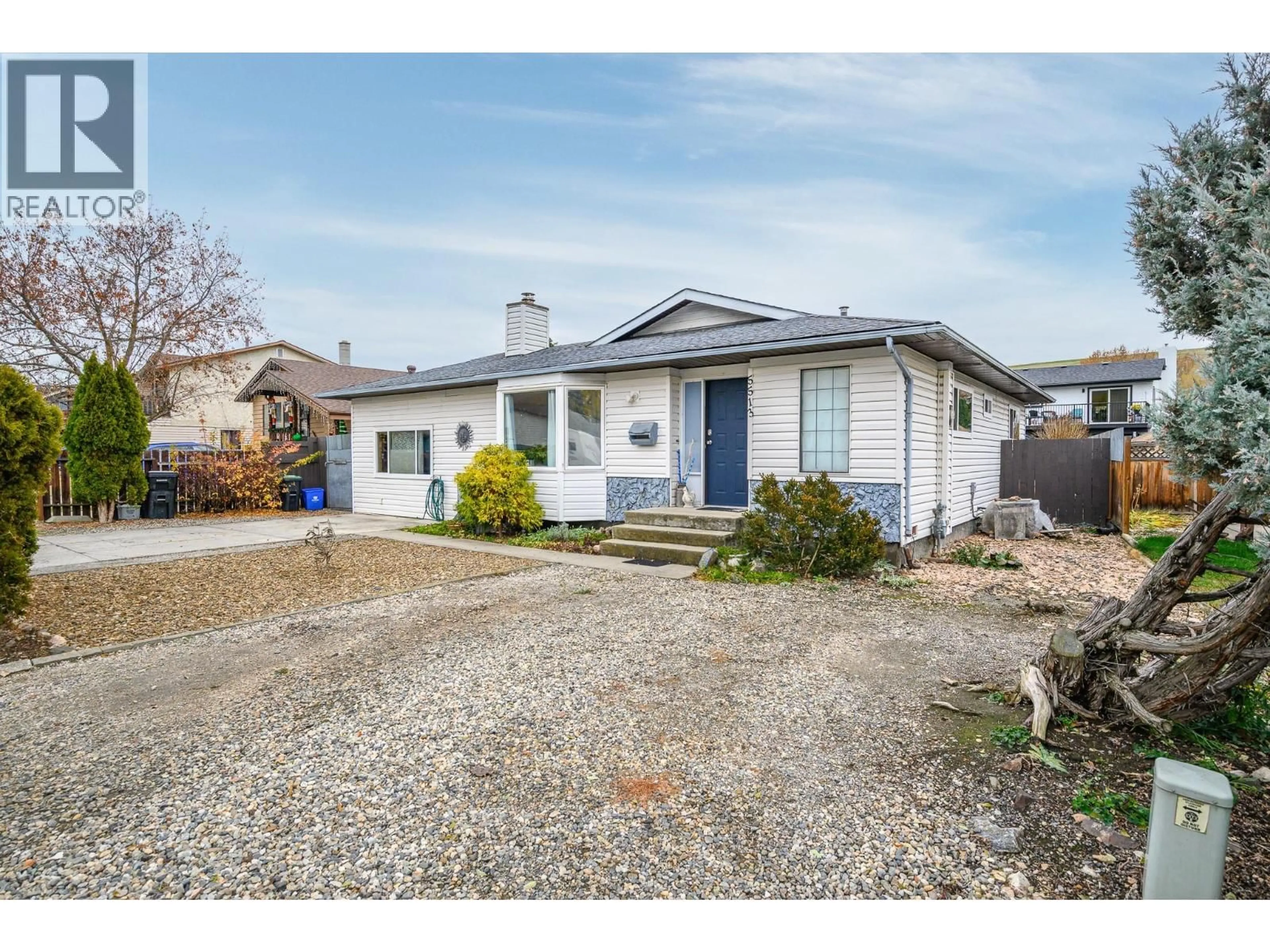 Home with vinyl exterior material, street for 5513 WILLOW DRIVE, Vernon British Columbia V1T7W3