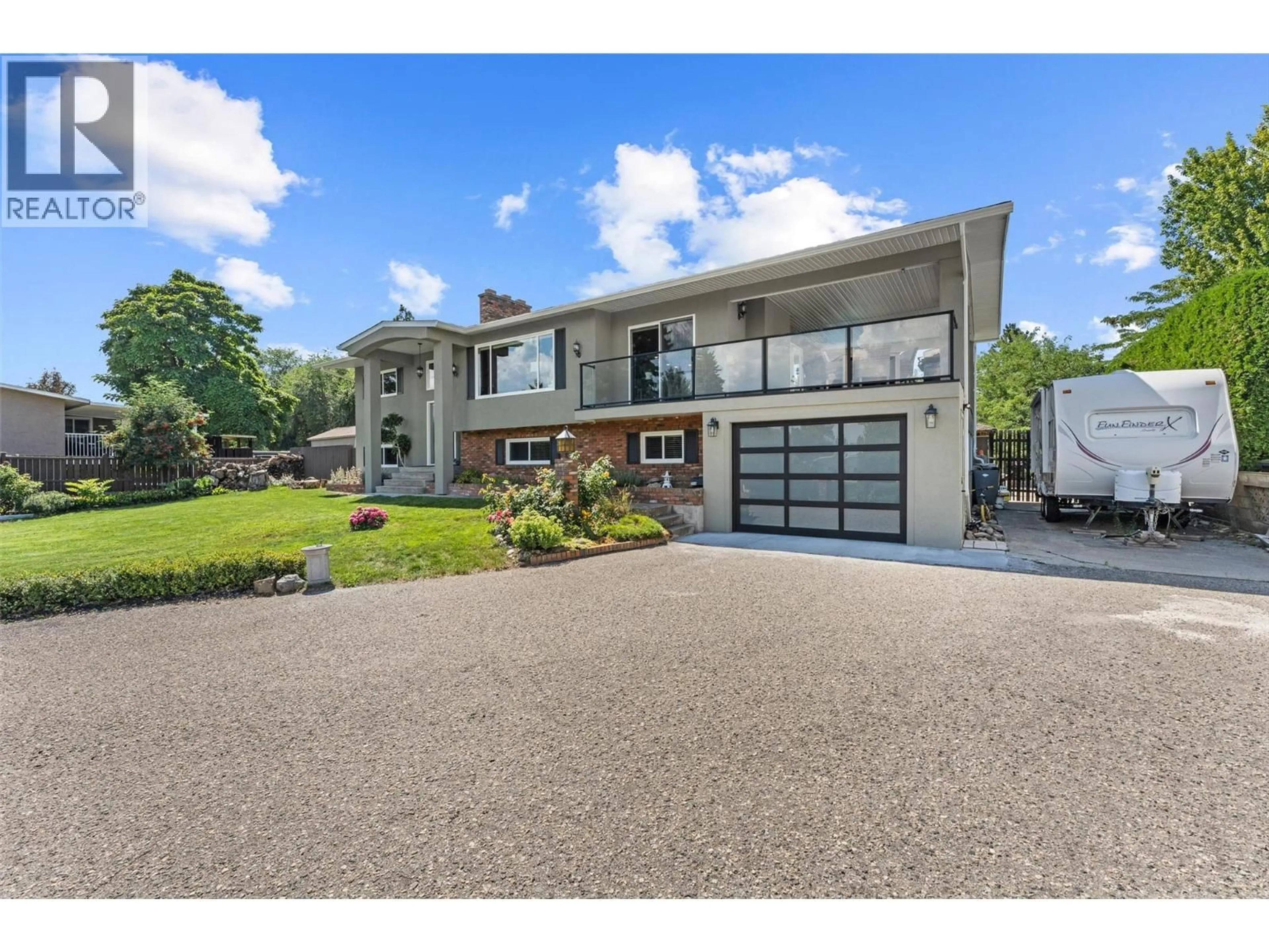 A pic from outside/outdoor area/front of a property/back of a property/a pic from drone, street for 2710 GUIDI ROAD, West Kelowna British Columbia V1Z2K4