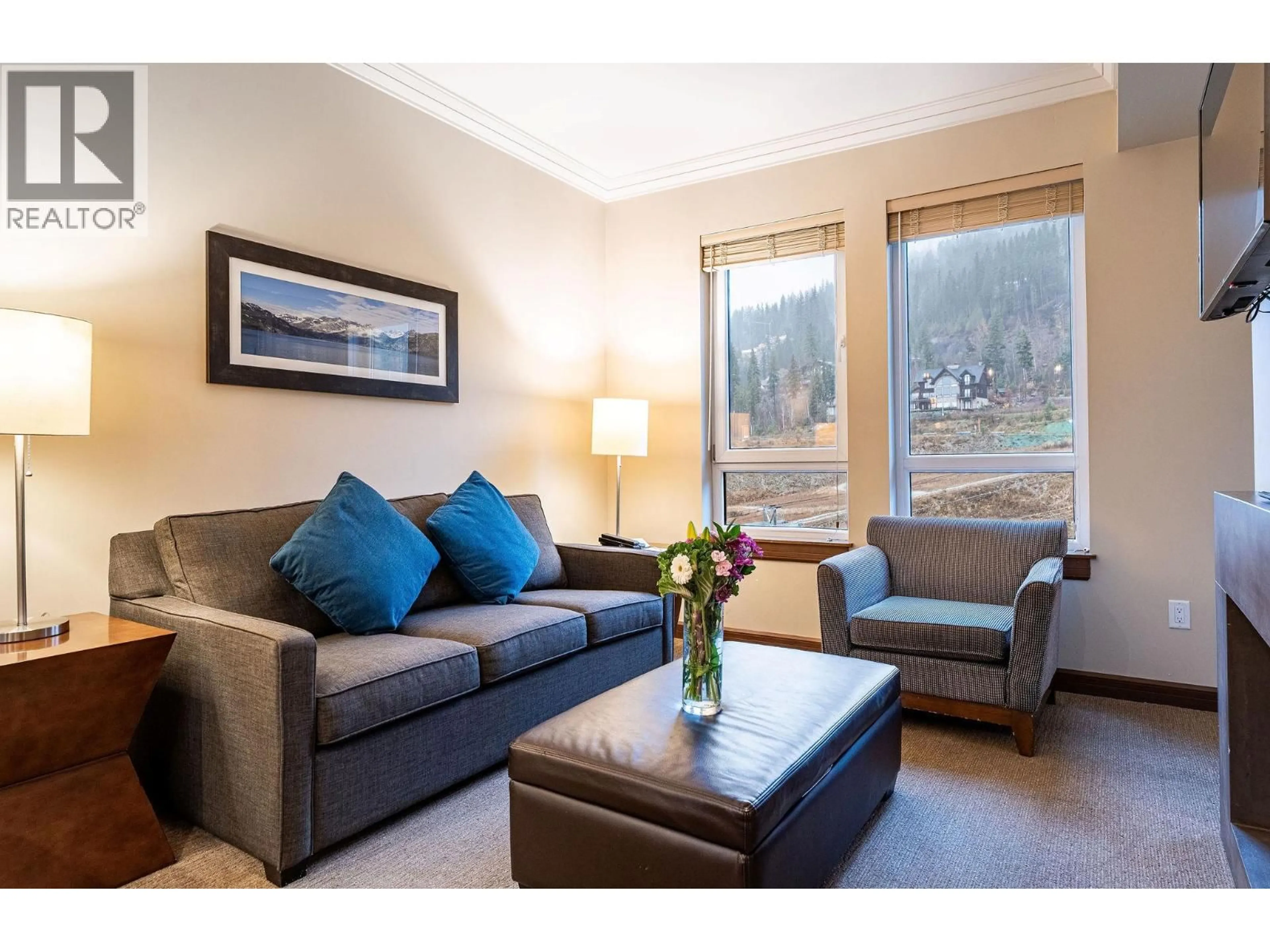 Living room with furniture, wood/laminate floor for 2631 - 2950 CAMOZZI ROAD, Revelstoke British Columbia V0E2S1