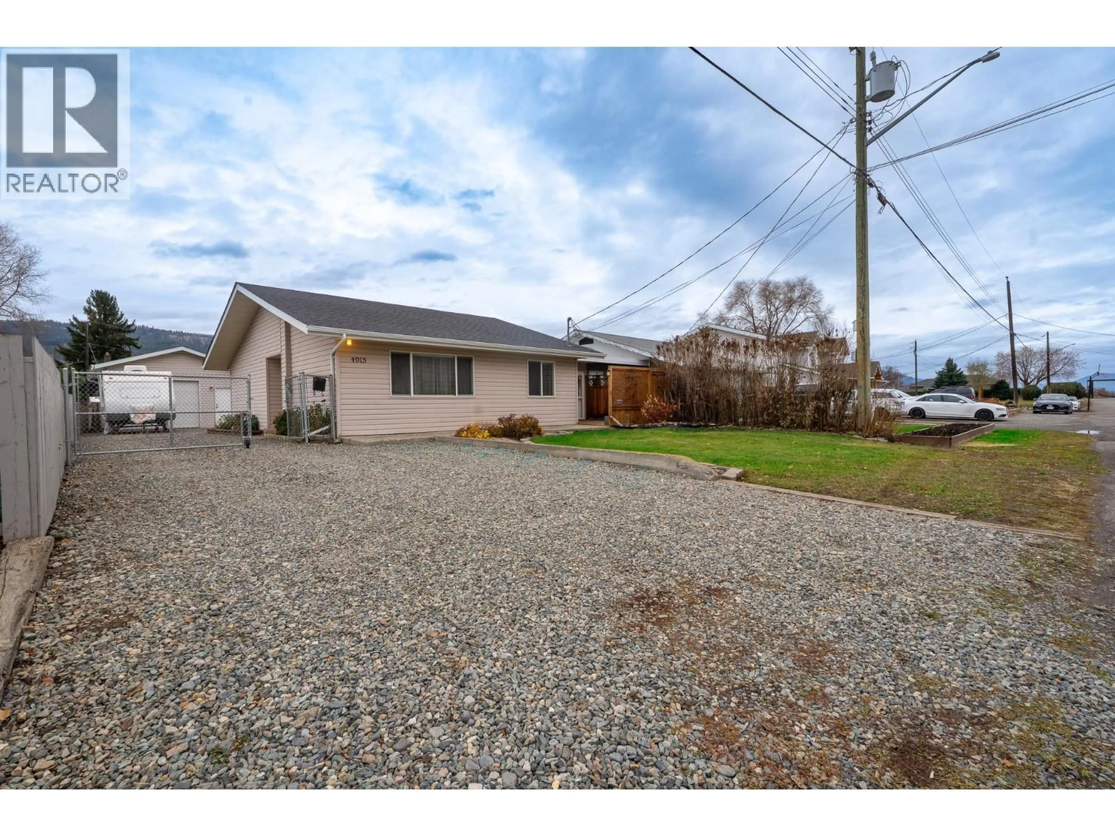 A pic from outside/outdoor area/front of a property/back of a property/a pic from drone, street for 4915 CAMMARAY DRIVE, Kamloops British Columbia V2H1L8