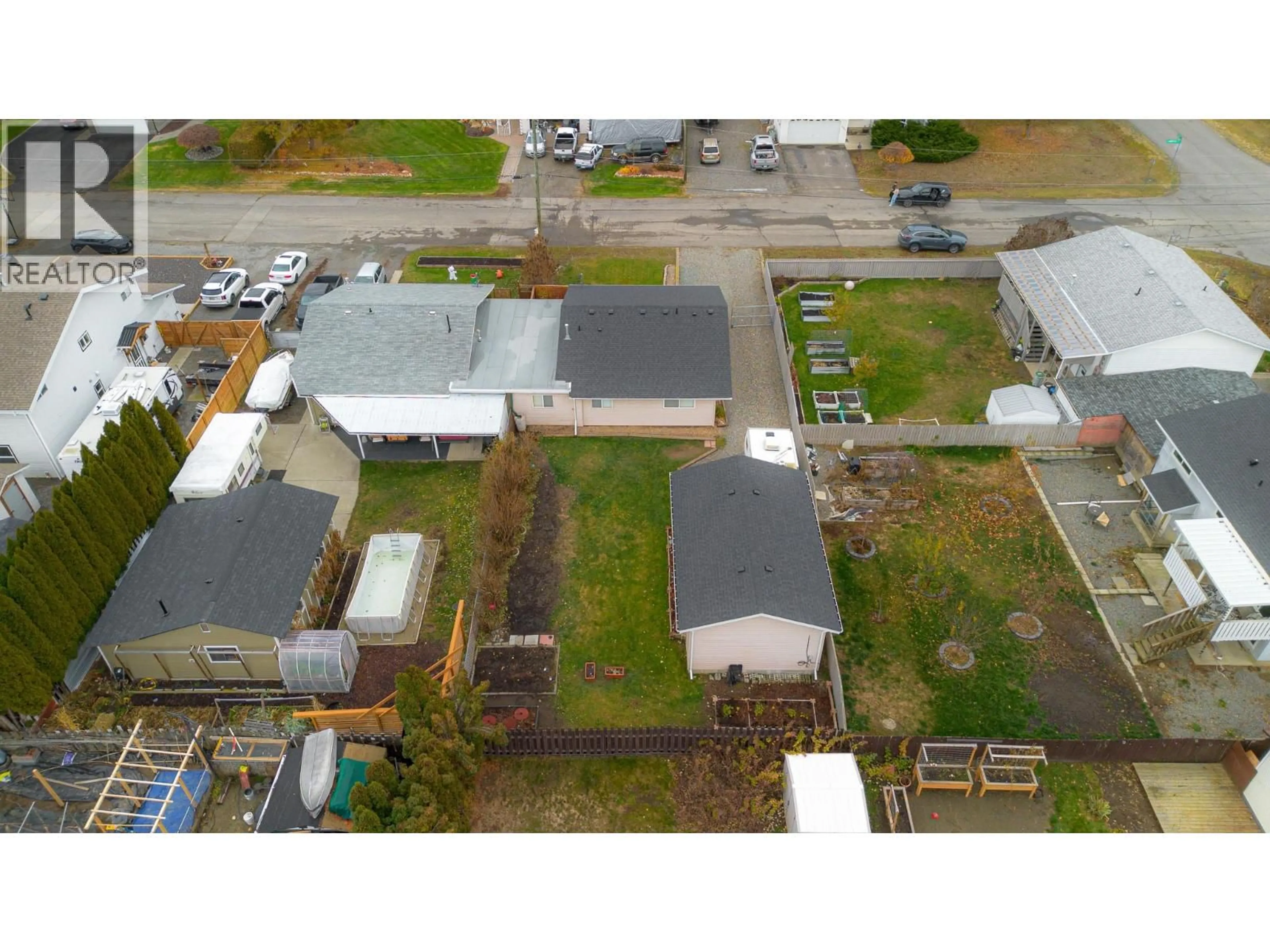 A pic from outside/outdoor area/front of a property/back of a property/a pic from drone, street for 4915 CAMMARAY DRIVE, Kamloops British Columbia V2H1L8