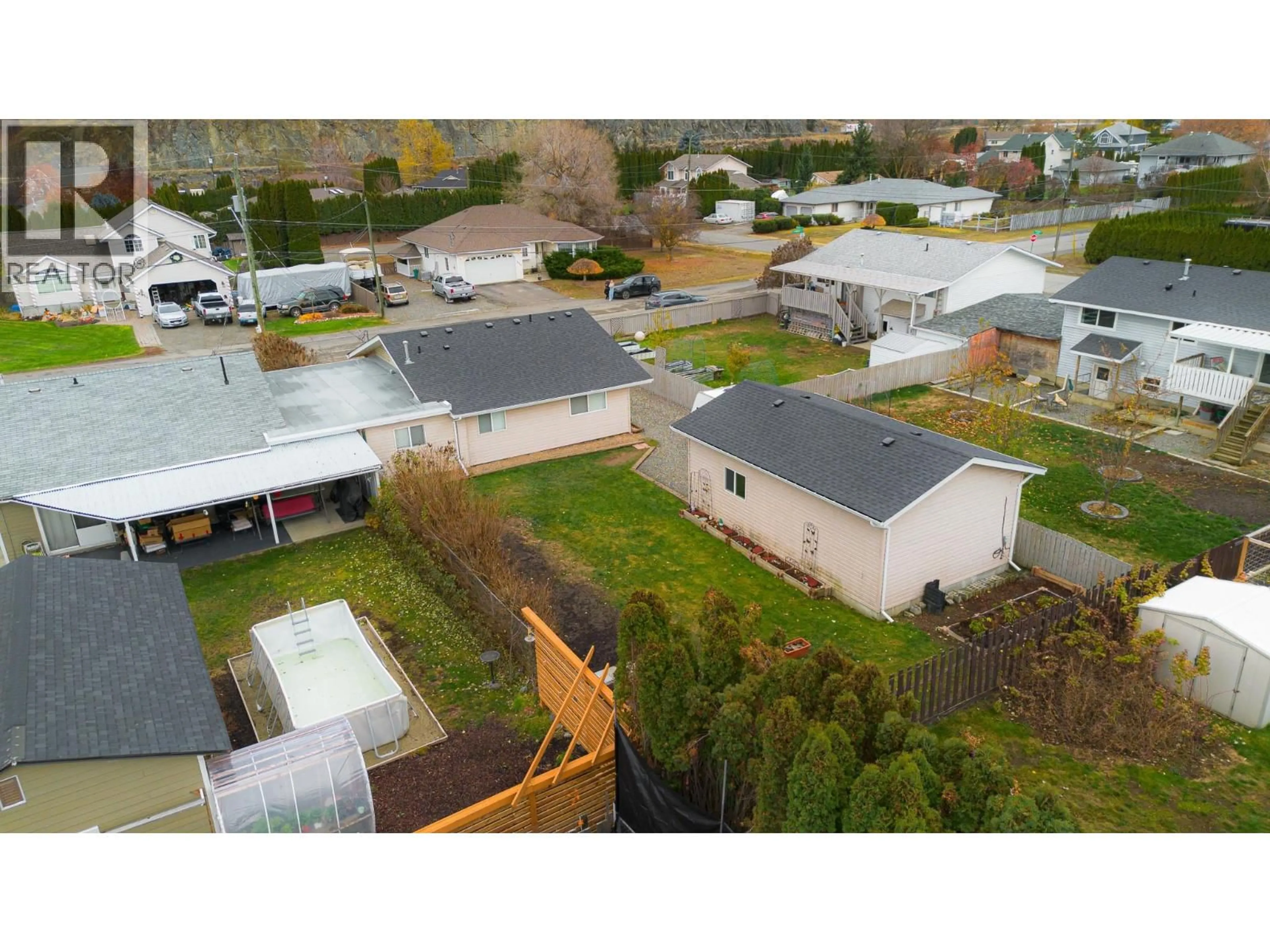 A pic from outside/outdoor area/front of a property/back of a property/a pic from drone, street for 4915 CAMMARAY DRIVE, Kamloops British Columbia V2H1L8