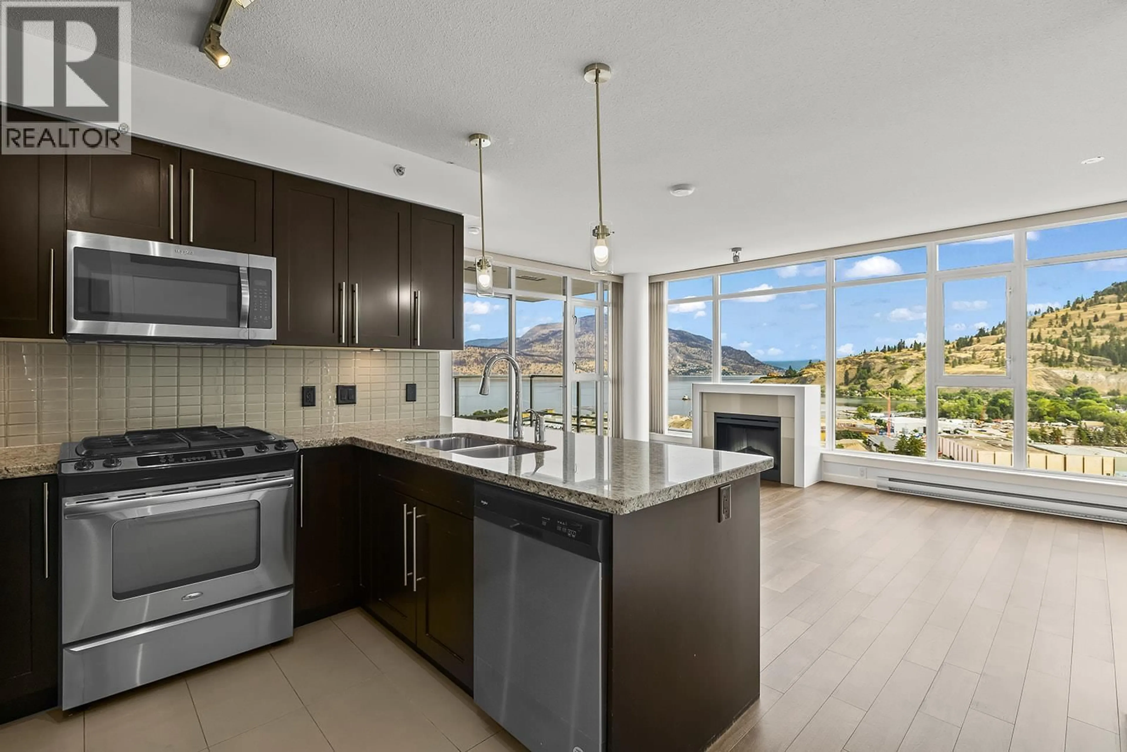 Open concept kitchen, ceramic/tile floor for 1902 - 1075 SUNSET DRIVE, Kelowna British Columbia V1Y9Y9