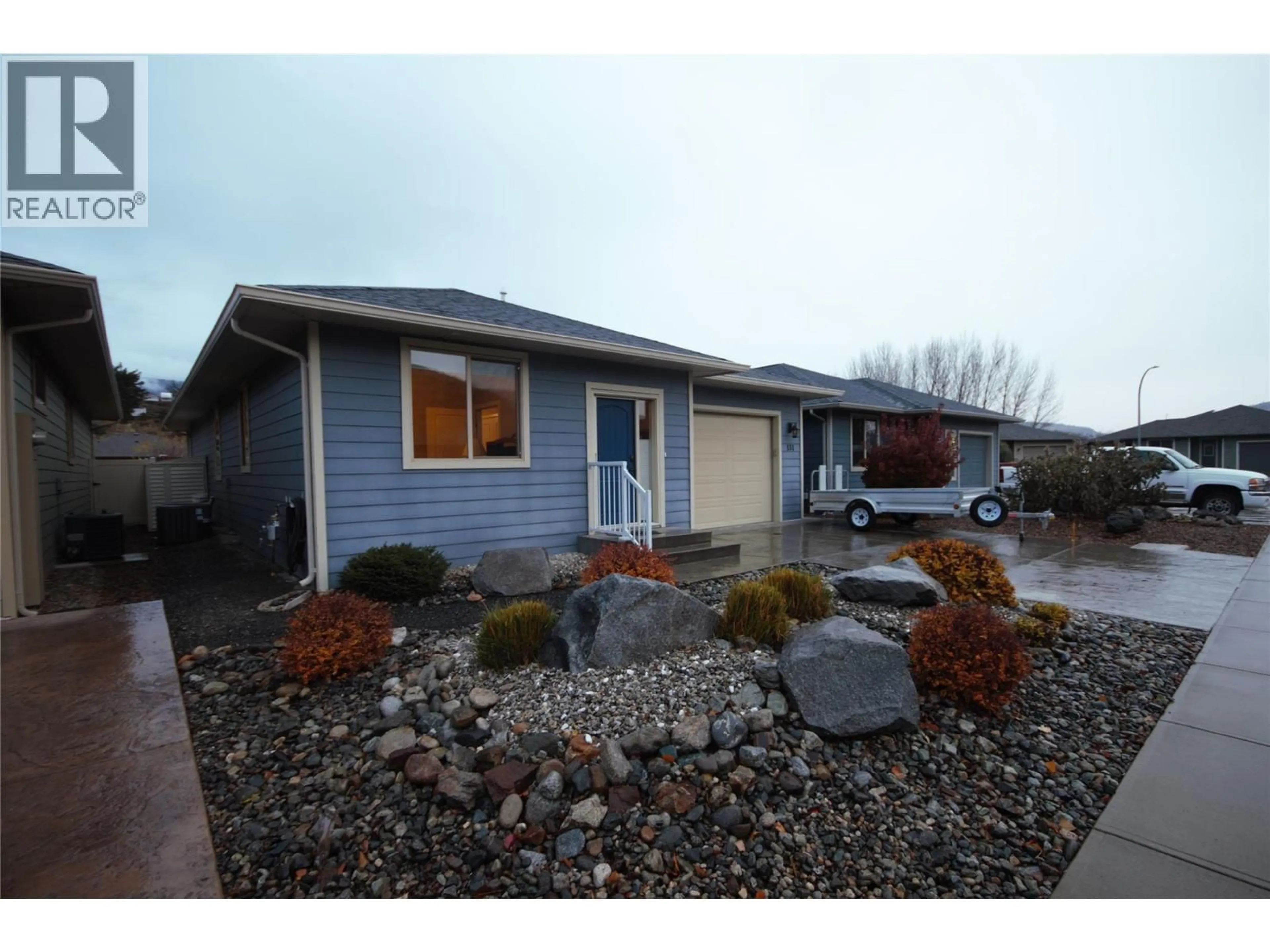 Home with vinyl exterior material, street for 131 WILLOWS PLACE, Oliver British Columbia V0H1T4