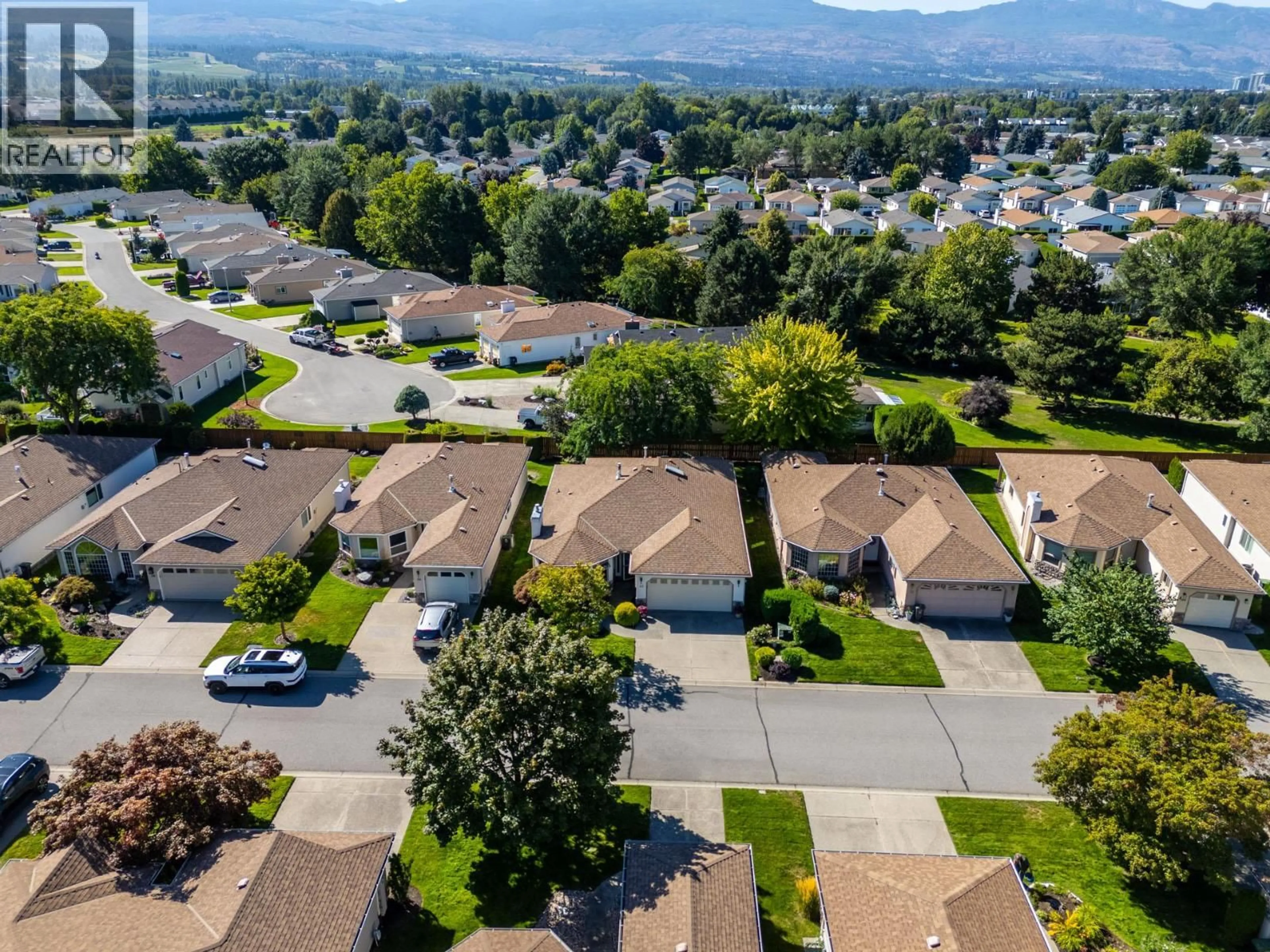 A pic from outside/outdoor area/front of a property/back of a property/a pic from drone, mountain view for 112 - 1201 CAMERON AVENUE, Kelowna British Columbia V1W3R9