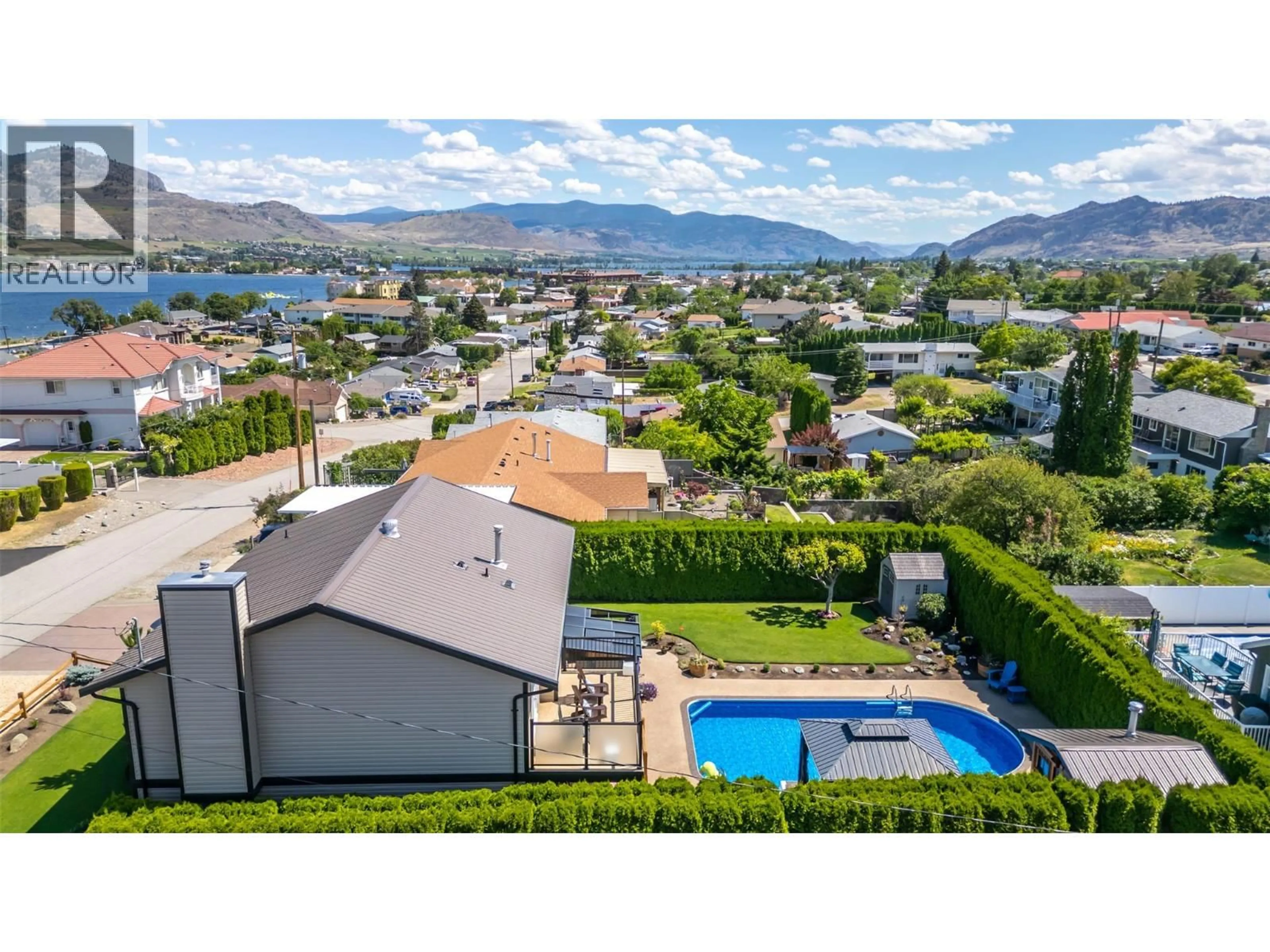 A pic from outside/outdoor area/front of a property/back of a property/a pic from drone, mountain view for 6 MCINTOSH COURT, Osoyoos British Columbia V0H1V0
