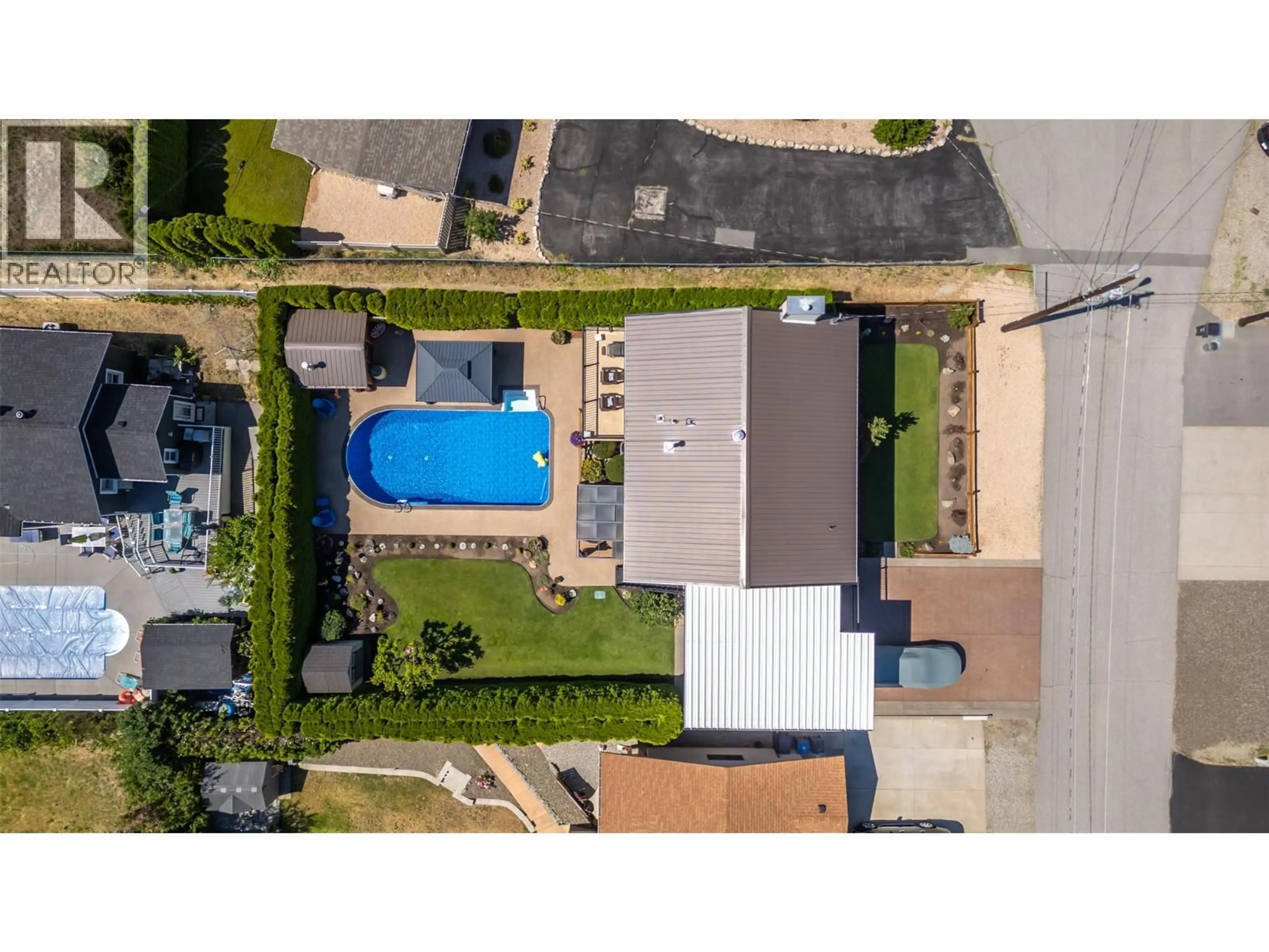 A pic from outside/outdoor area/front of a property/back of a property/a pic from drone, street for 6 MCINTOSH COURT, Osoyoos British Columbia V0H1V0