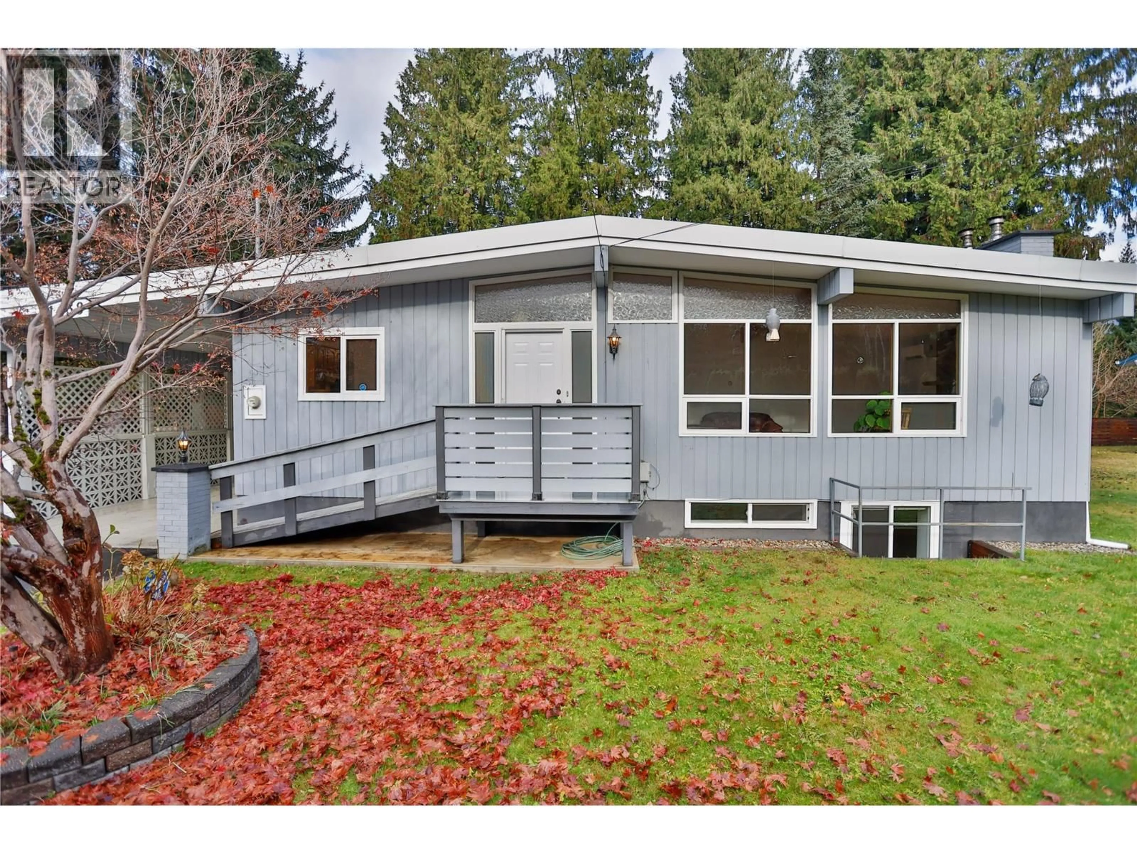 Home with vinyl exterior material, street for 1438 NICHOL ROAD, Revelstoke British Columbia V0E2S1