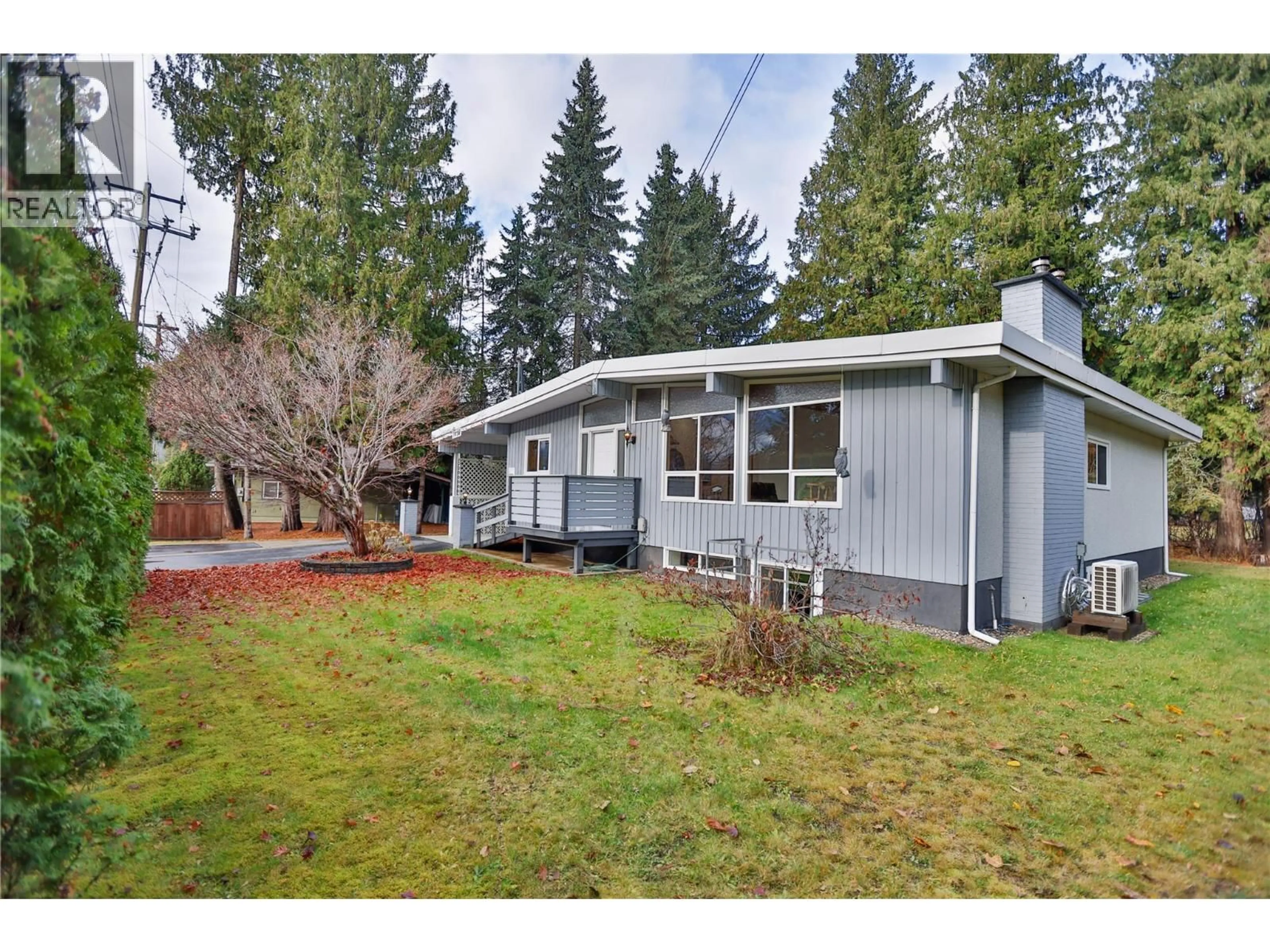 Home with vinyl exterior material, street for 1438 NICHOL ROAD, Revelstoke British Columbia V0E2S1