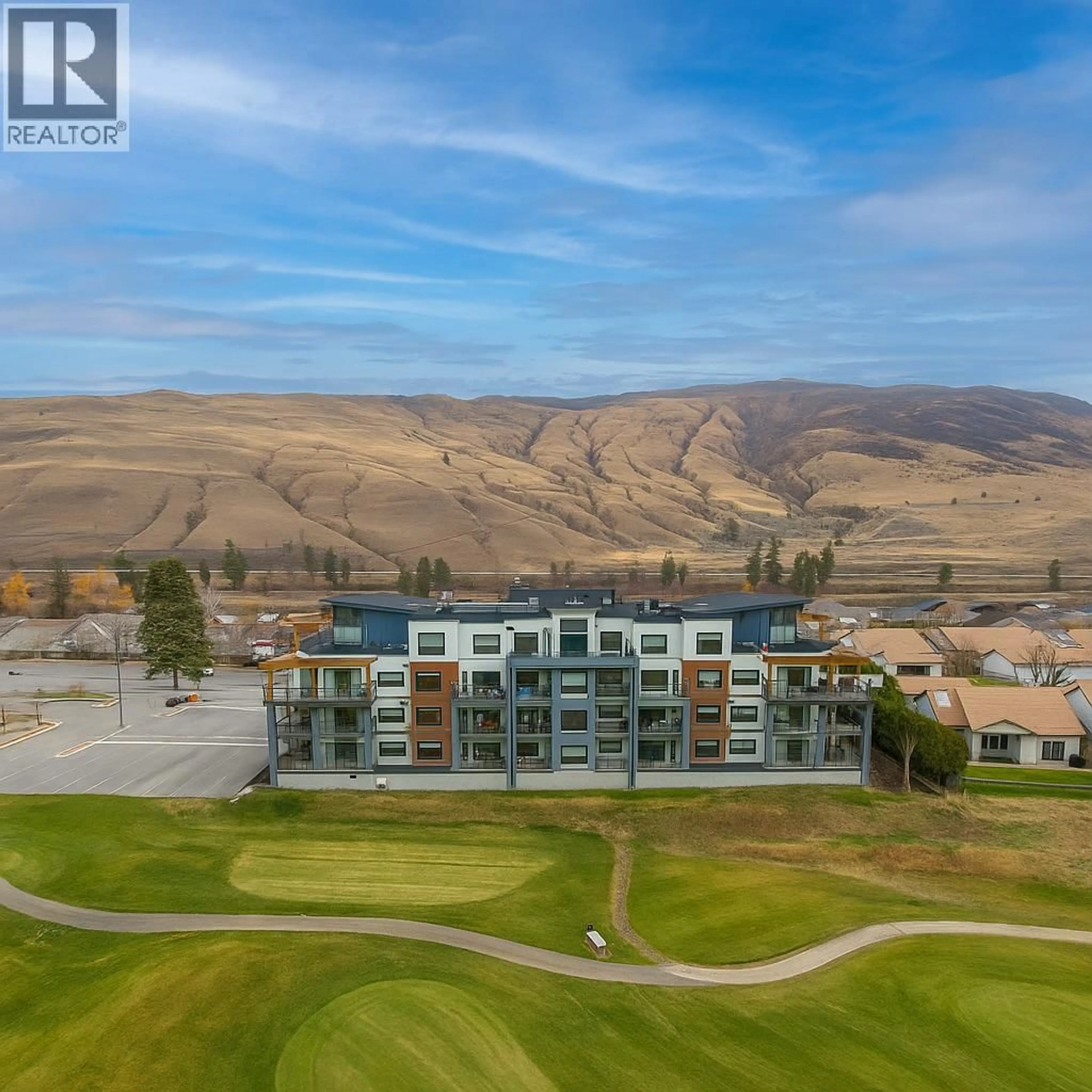 A pic from outside/outdoor area/front of a property/back of a property/a pic from drone, water/lake/river/ocean view for 405 - 651 DUNES DRIVE, Kamloops British Columbia V2B0K2