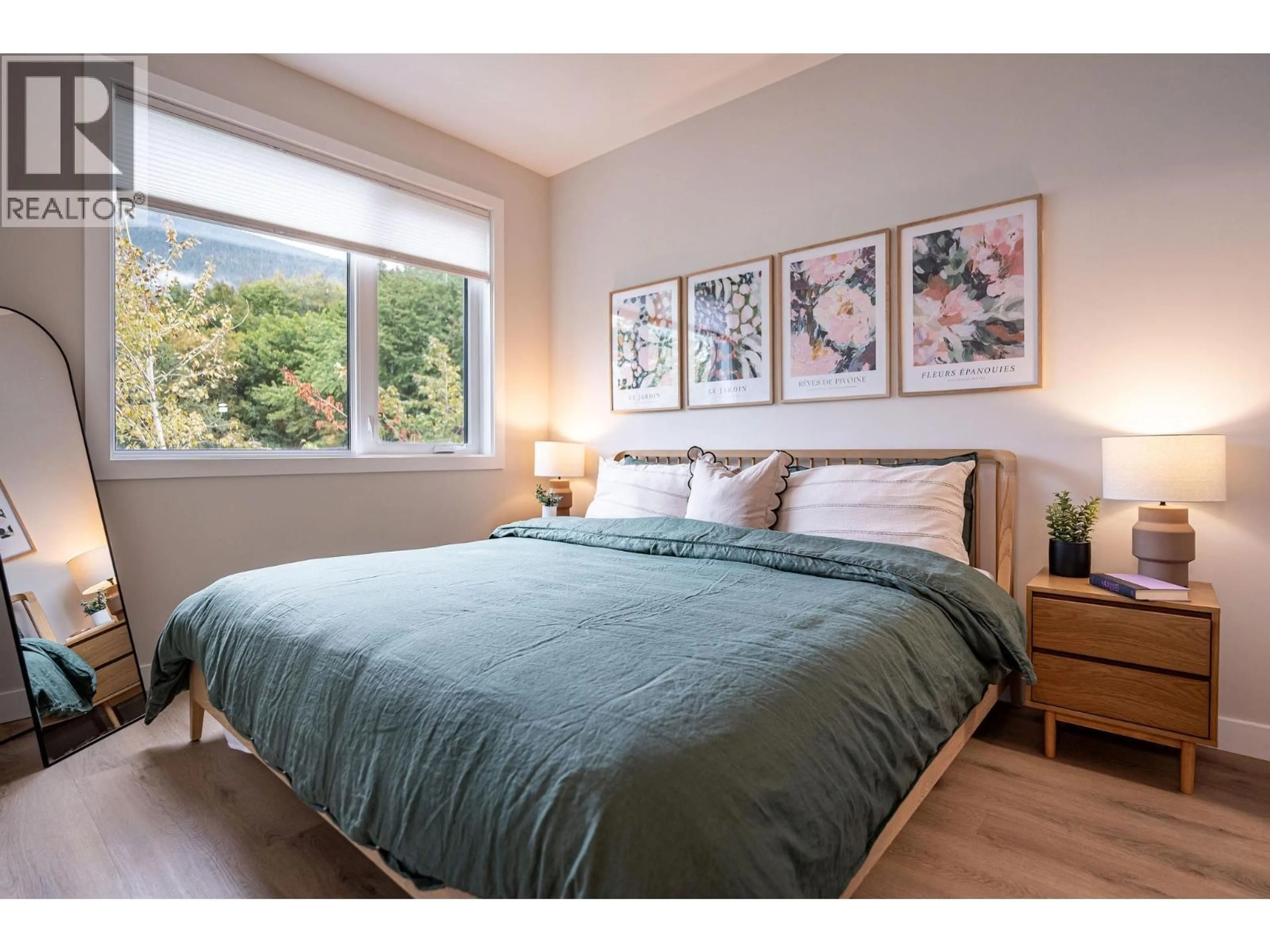 Bedroom with bed, wood/laminate floor for 1206 DOUGLAS STREET WEST, Revelstoke British Columbia V0E2S0