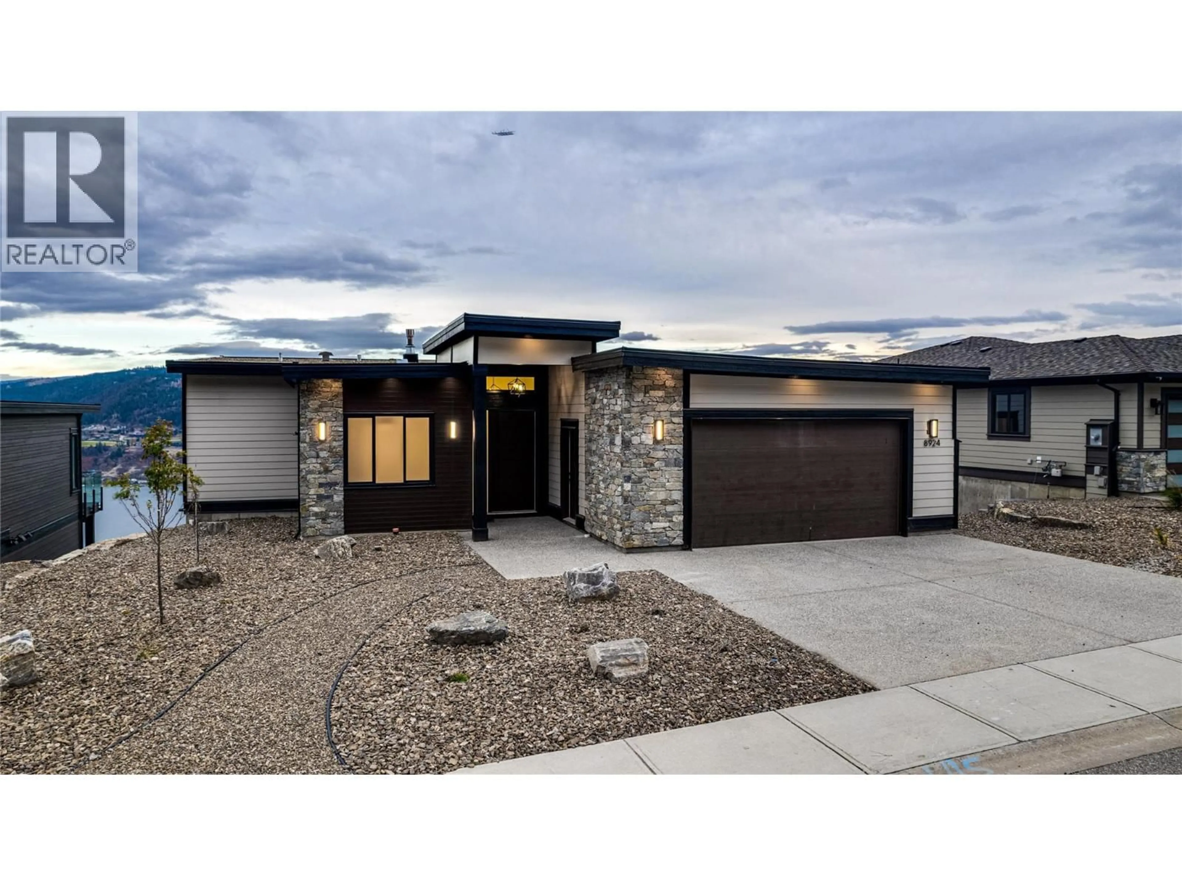 Home with brick exterior material, street for 8924 TAVISTOCK ROAD, Vernon British Columbia V1H2L4