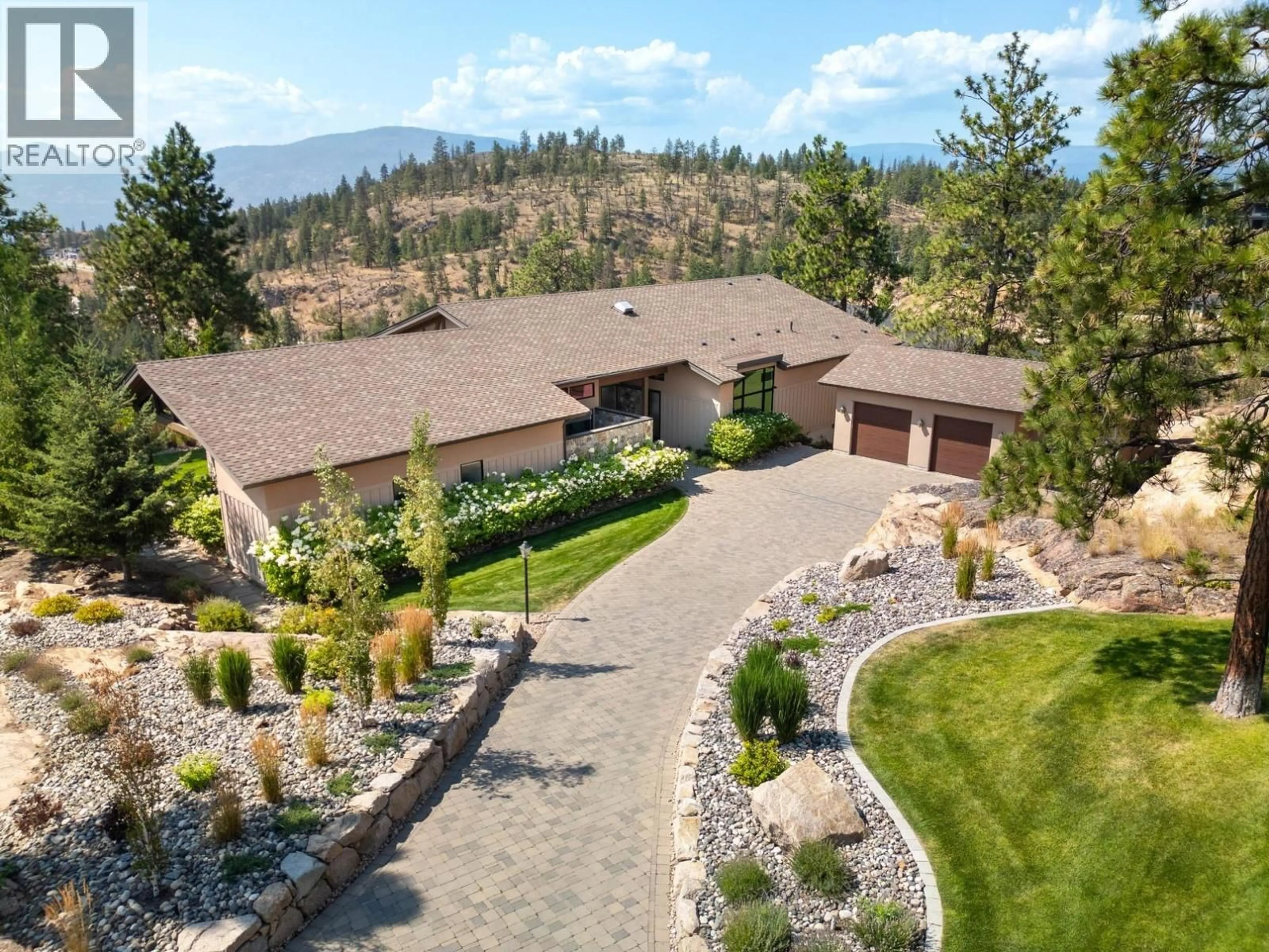 A pic from outside/outdoor area/front of a property/back of a property/a pic from drone, mountain view for 508 VARDON LANE, Vernon British Columbia V1H1Y4