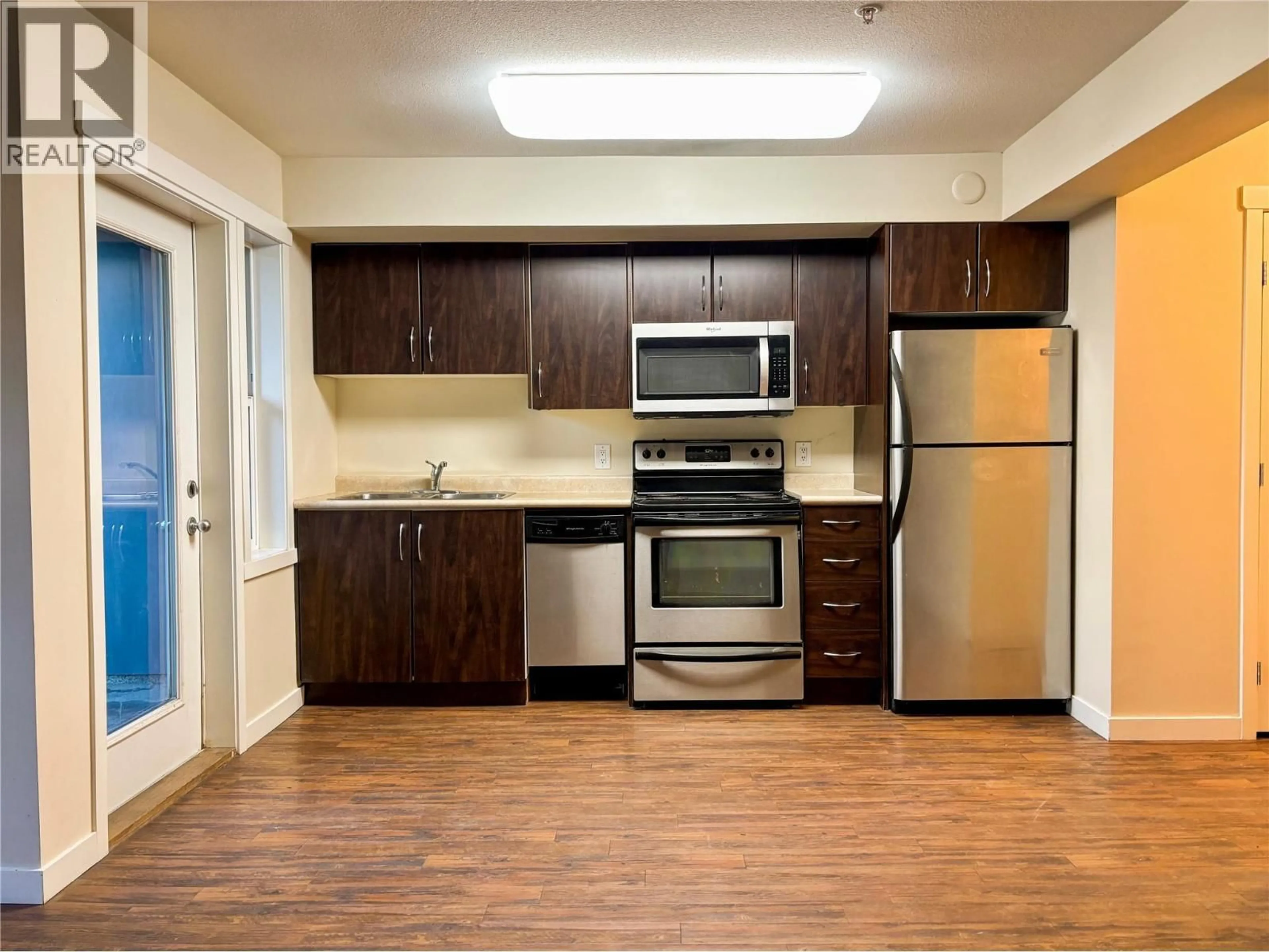 Standard kitchen, wood/laminate floor for 106 - 1475 GLENMORE ROAD NORTH, Kelowna British Columbia V1V2C5