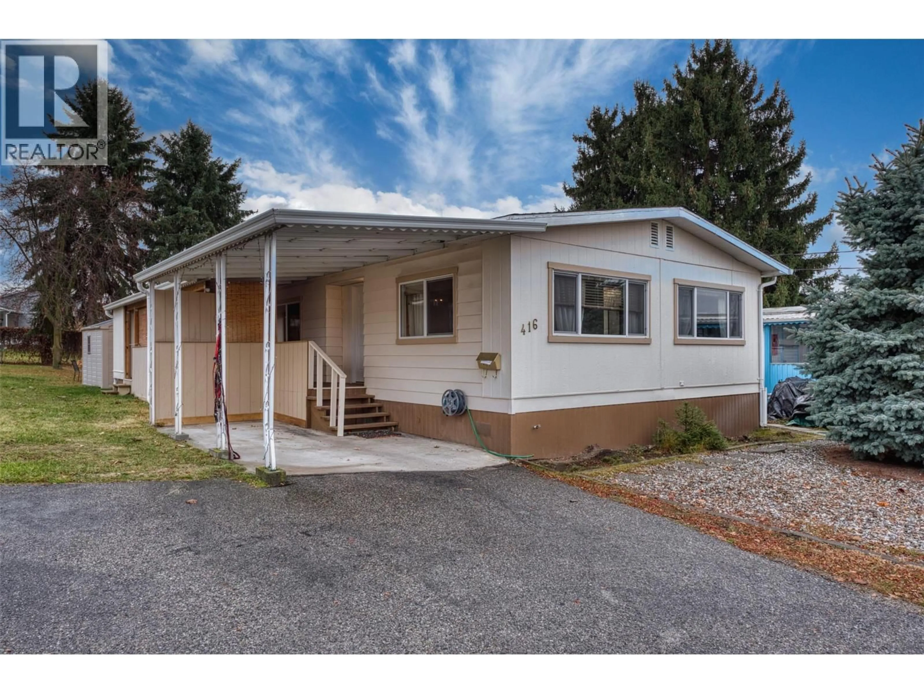 Home with vinyl exterior material, street for 416 - 3591 OLD VERNON ROAD, Kelowna British Columbia V1X6B4