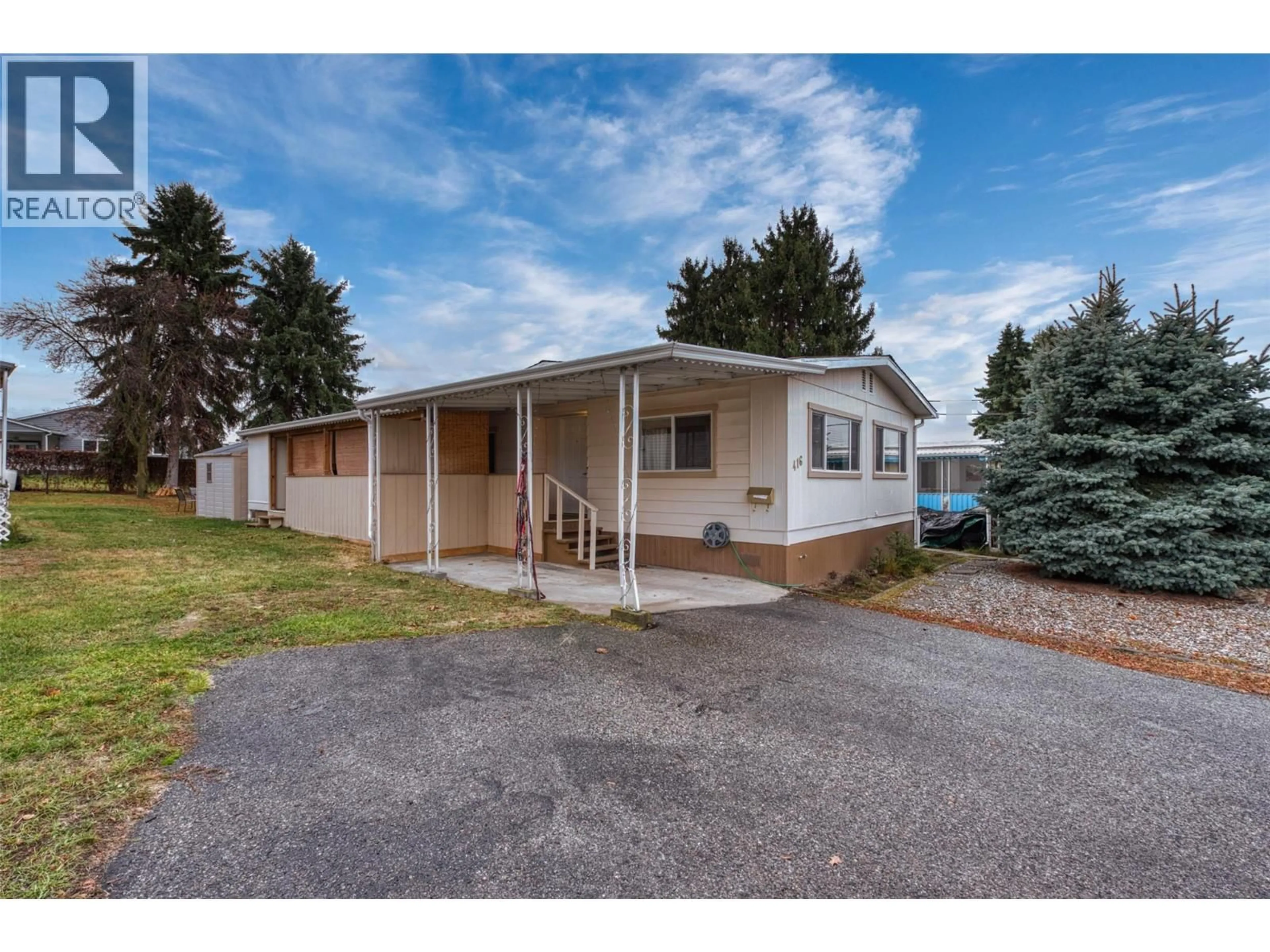 Home with vinyl exterior material, street for 416 - 3591 OLD VERNON ROAD, Kelowna British Columbia V1X6B4