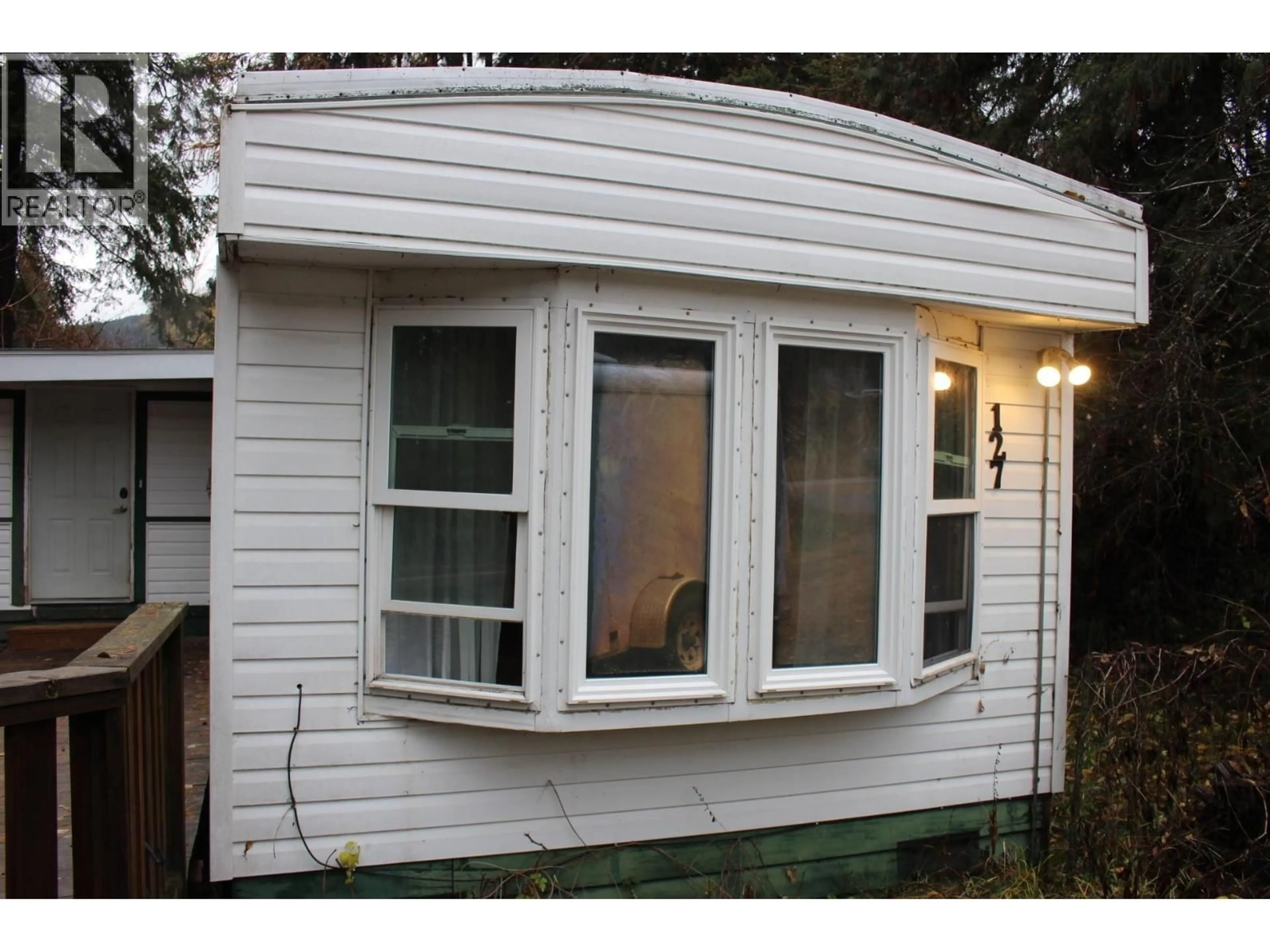 Home with vinyl exterior material, building for 127 MILL ROAD, Fruitvale British Columbia V0G1L0