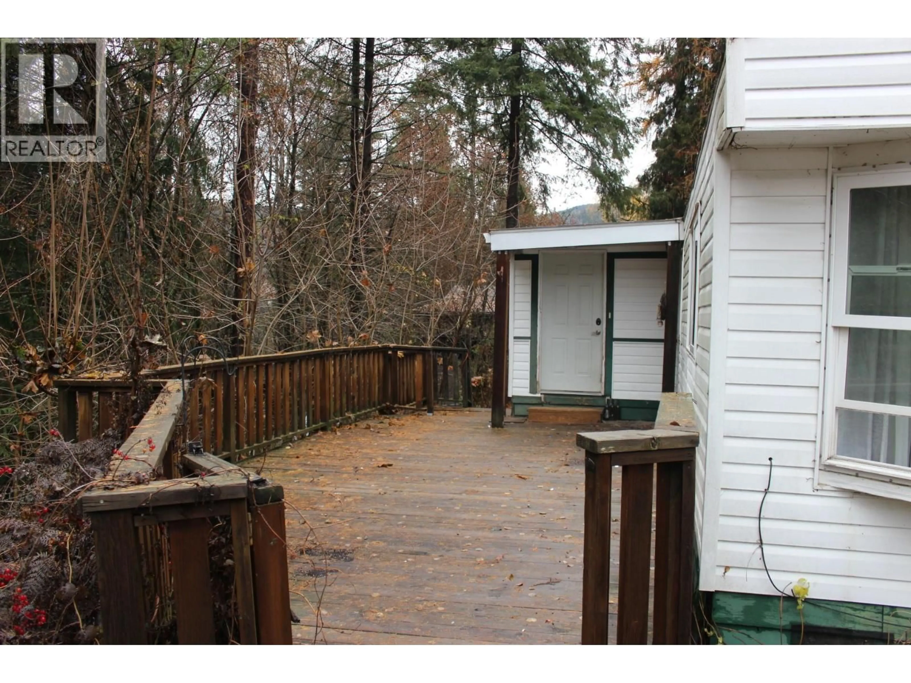 Patio, forest/trees view for 127 MILL ROAD, Fruitvale British Columbia V0G1L0