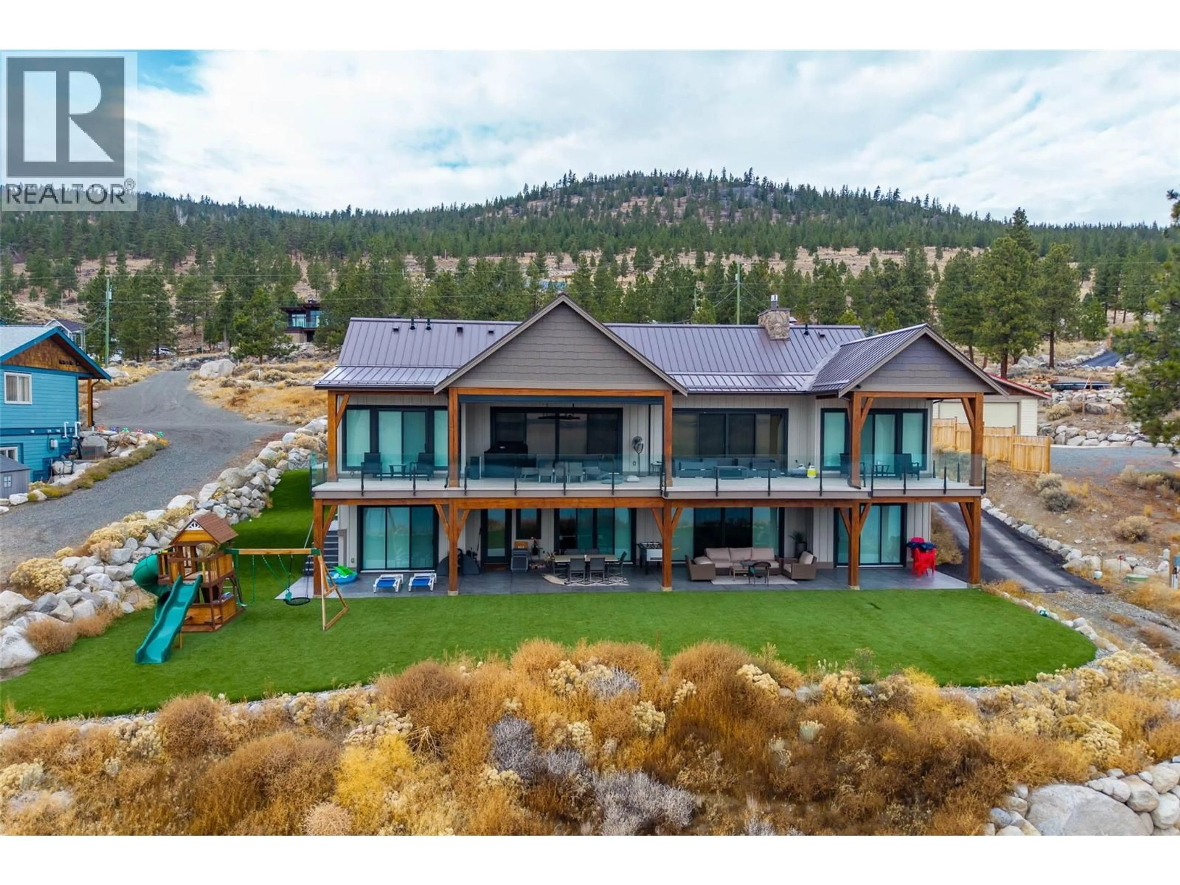 A pic from outside/outdoor area/front of a property/back of a property/a pic from drone, mountain view for 6564 MONCK PARK ROAD, Merritt British Columbia V1K0A1