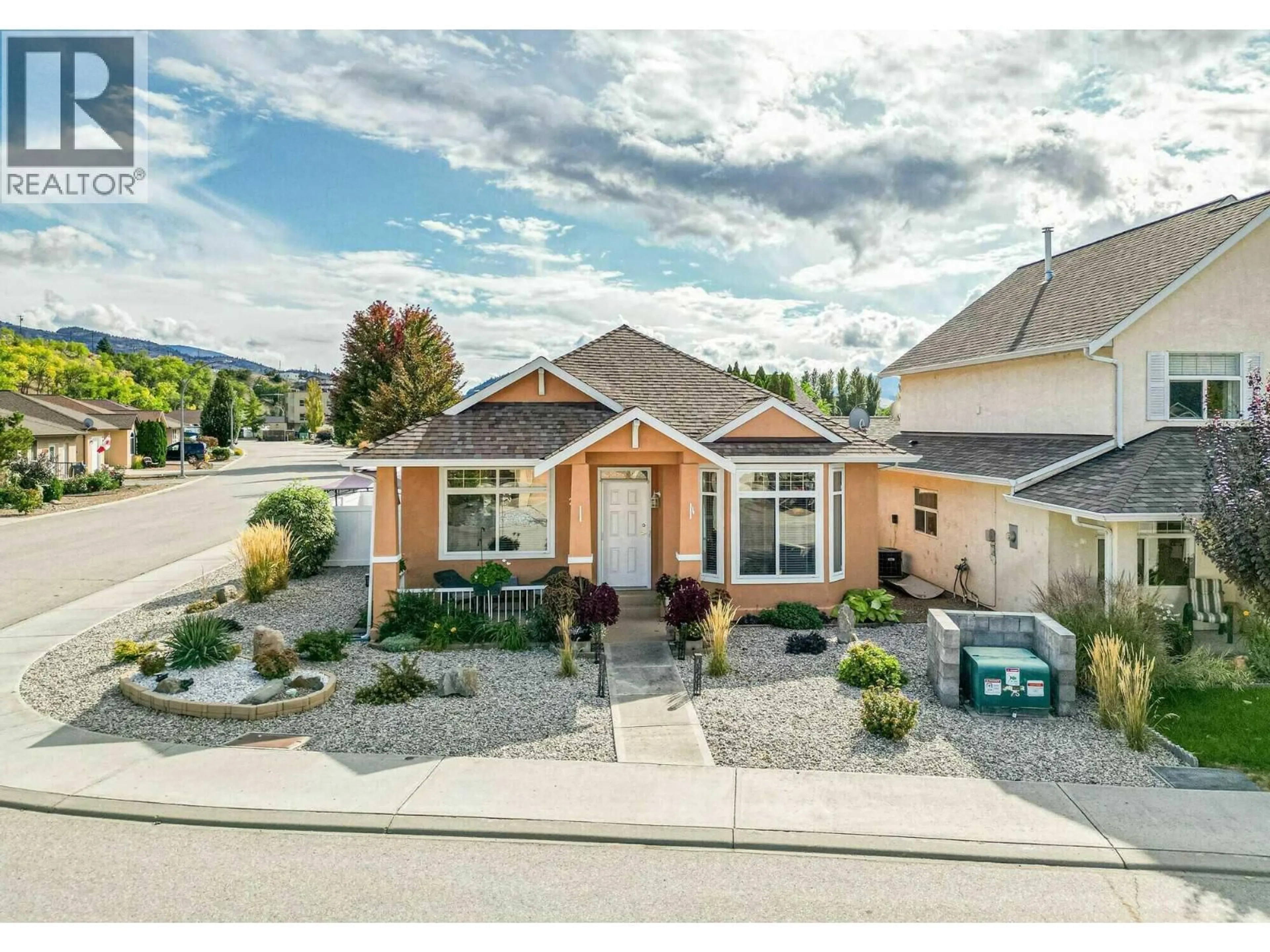 Home with vinyl exterior material, street for 247 WILLOWS PLACE, Oliver British Columbia V0H1T4