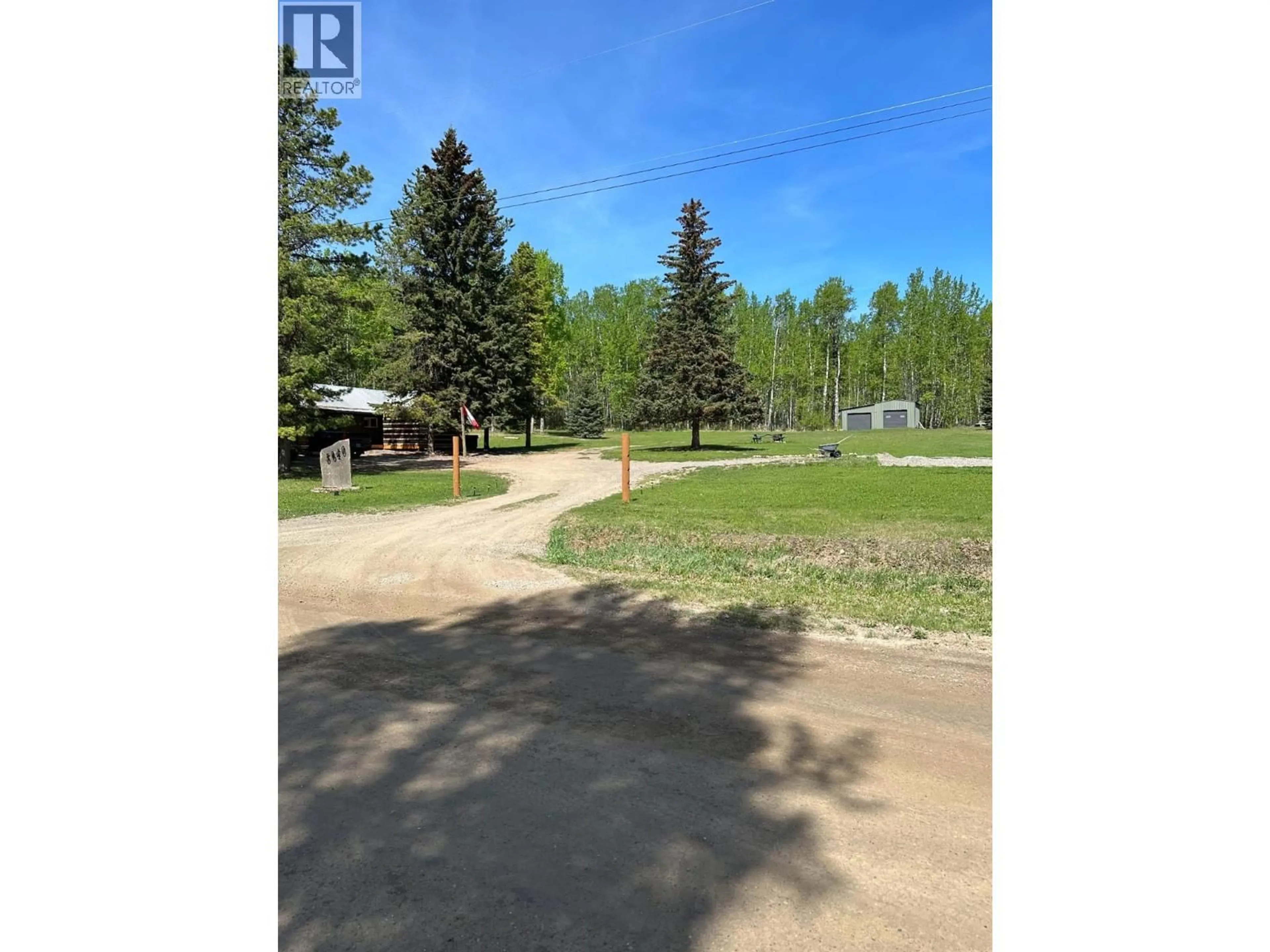 A pic from outside/outdoor area/front of a property/back of a property/a pic from drone, forest/trees view for 5640 WESTGATE ROAD NORTHWEST, Chetwynd British Columbia V0C1J0