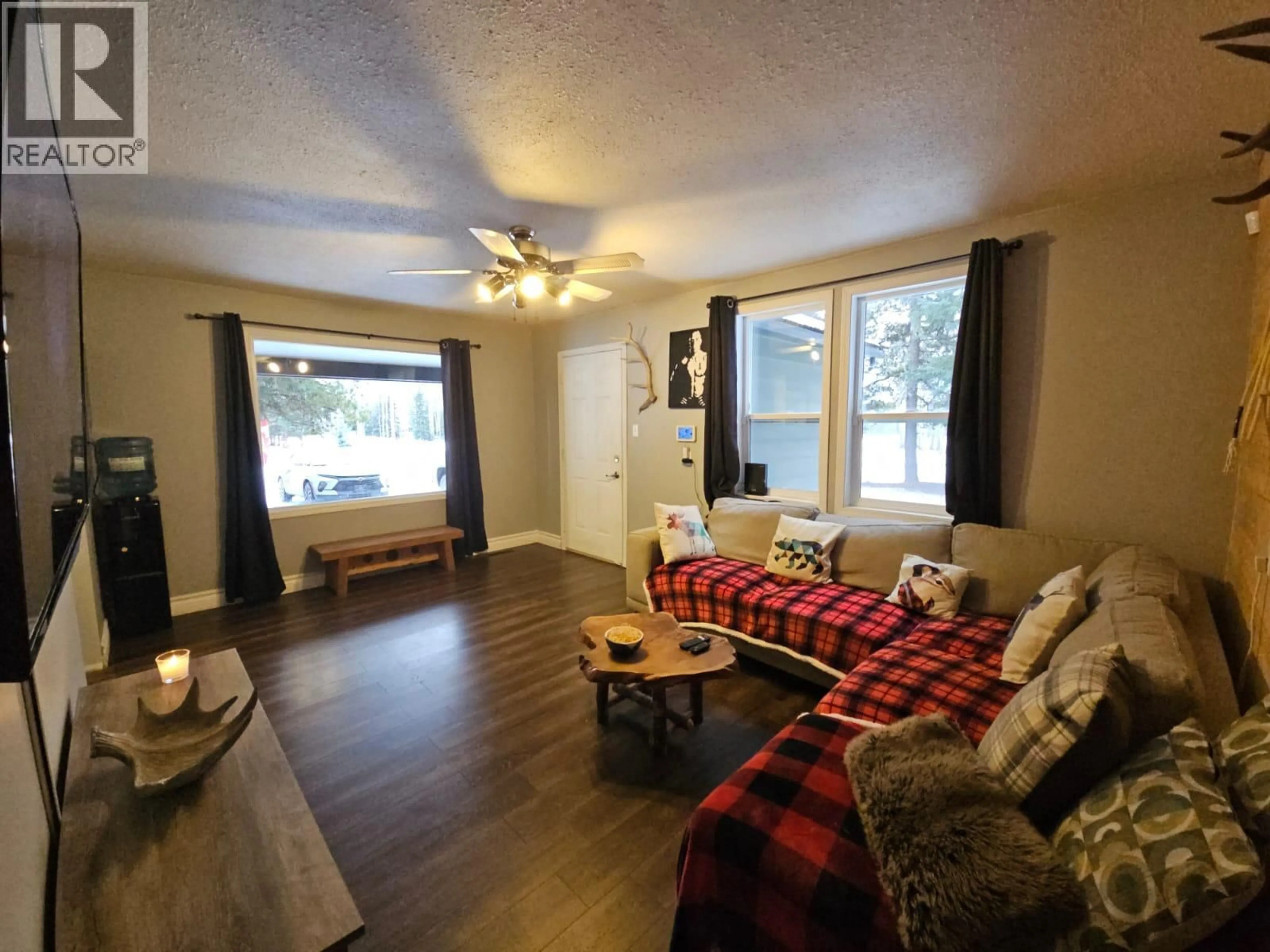 Living room with furniture, wood/laminate floor for 5640 WESTGATE ROAD NORTHWEST, Chetwynd British Columbia V0C1J0