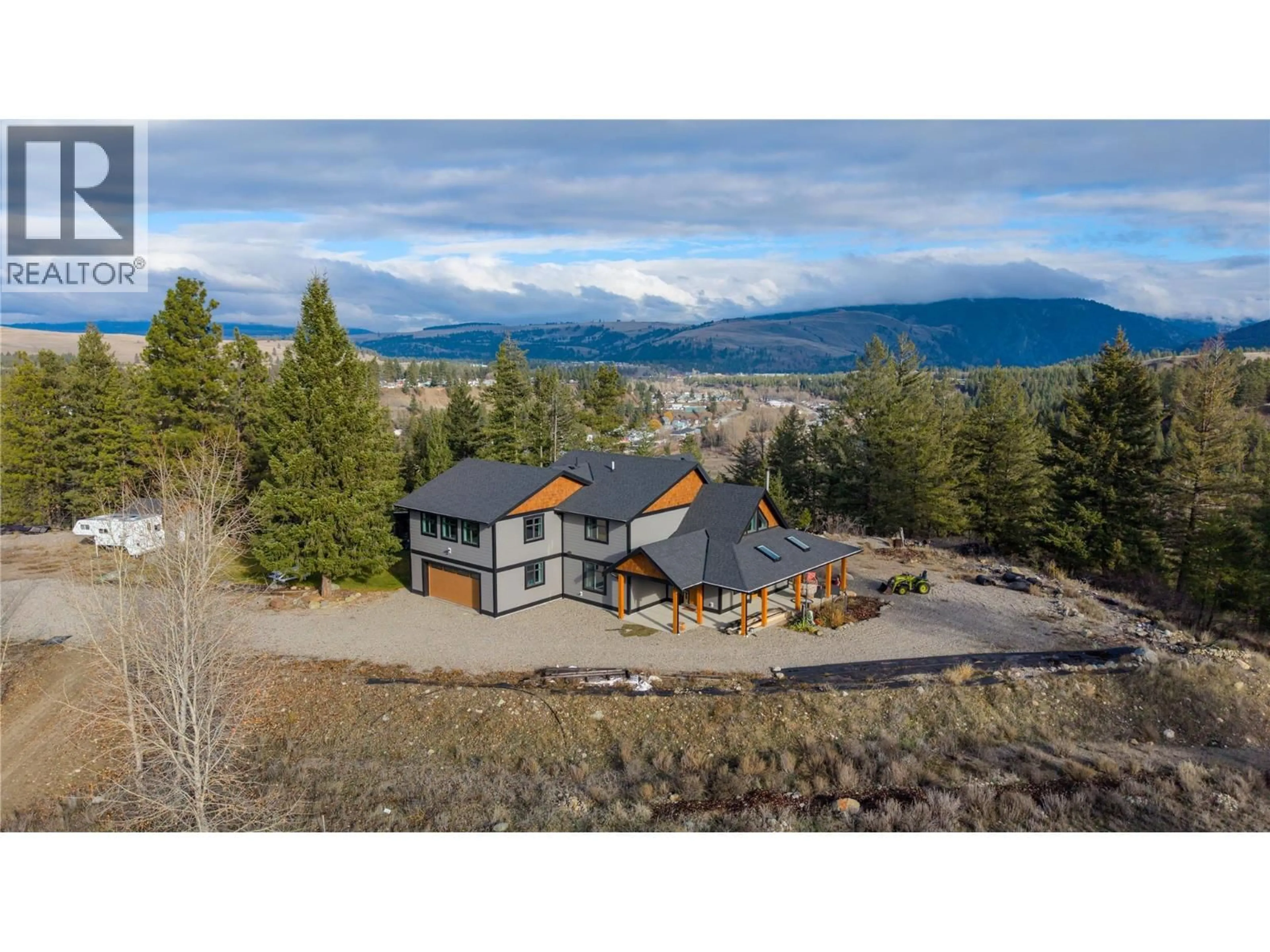A pic from outside/outdoor area/front of a property/back of a property/a pic from drone, mountain view for 3-640 HWY 3 OTHER, Princeton British Columbia V0X1W0