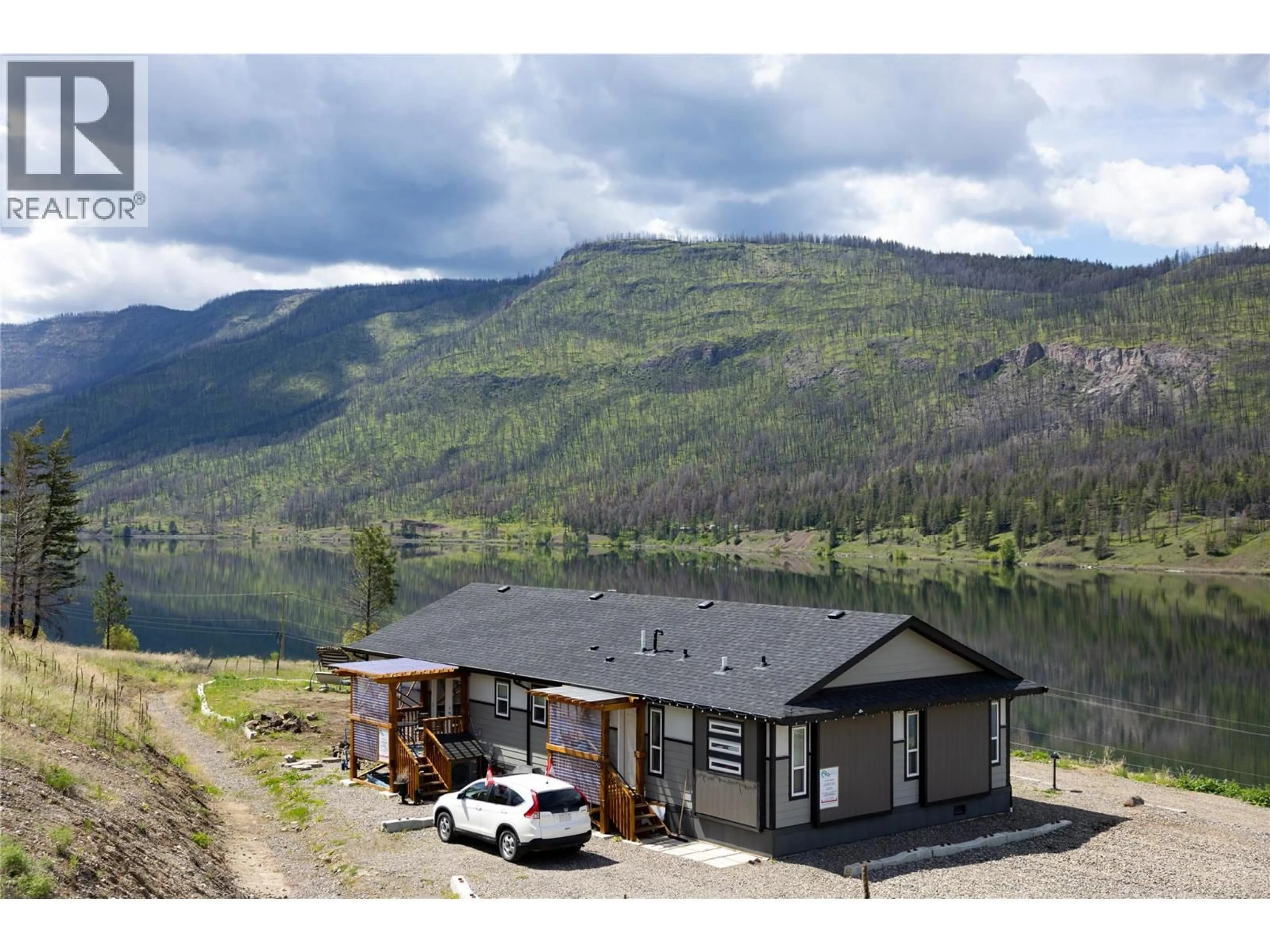 A pic from outside/outdoor area/front of a property/back of a property/a pic from drone, water/lake/river/ocean view for 3919 HIGHWAY 97 OTHER, Monte Lake British Columbia V0E2N0
